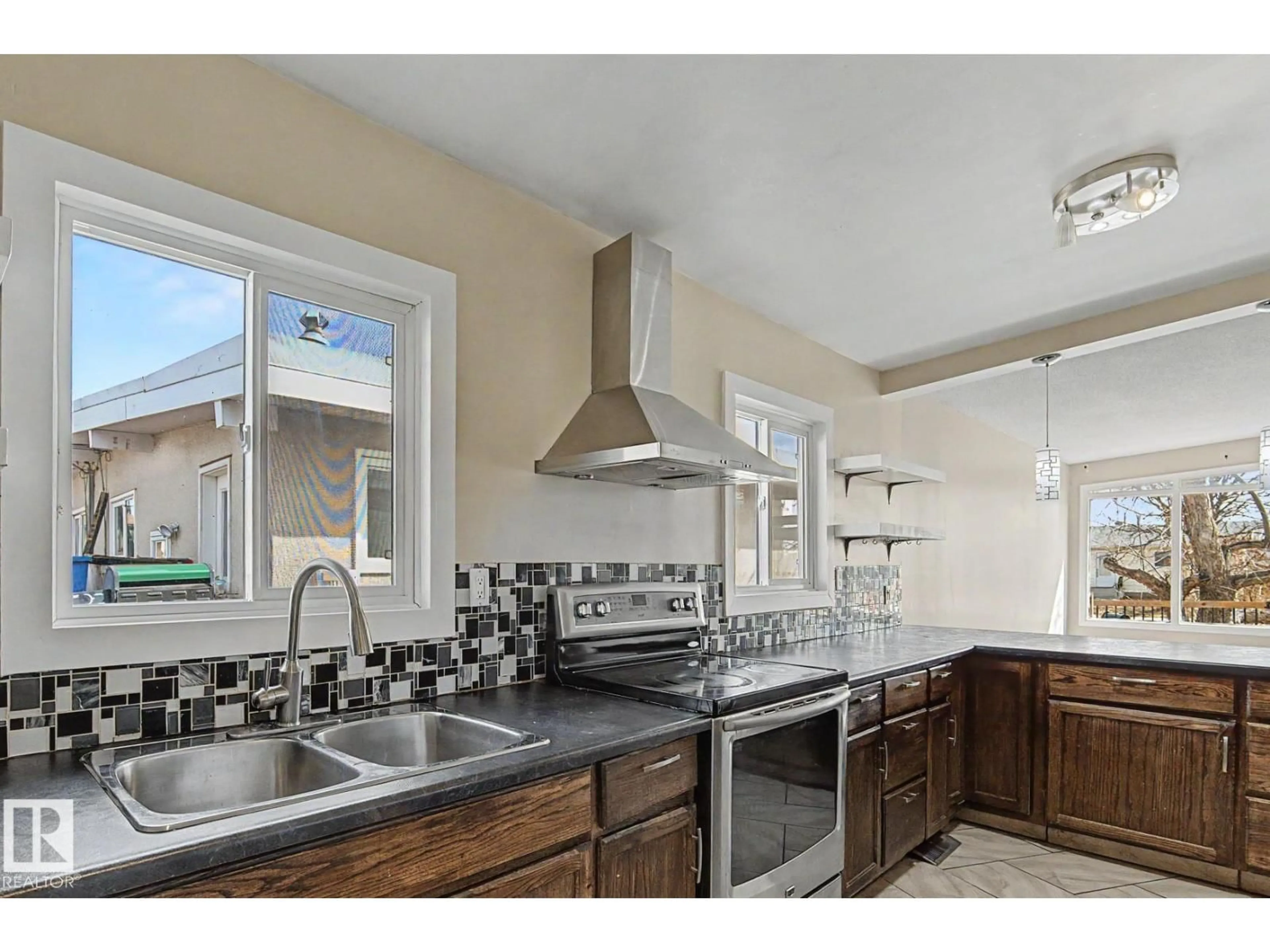 Open concept kitchen, ceramic/tile floor for 5920 132 AV, Edmonton Alberta T5A0J1