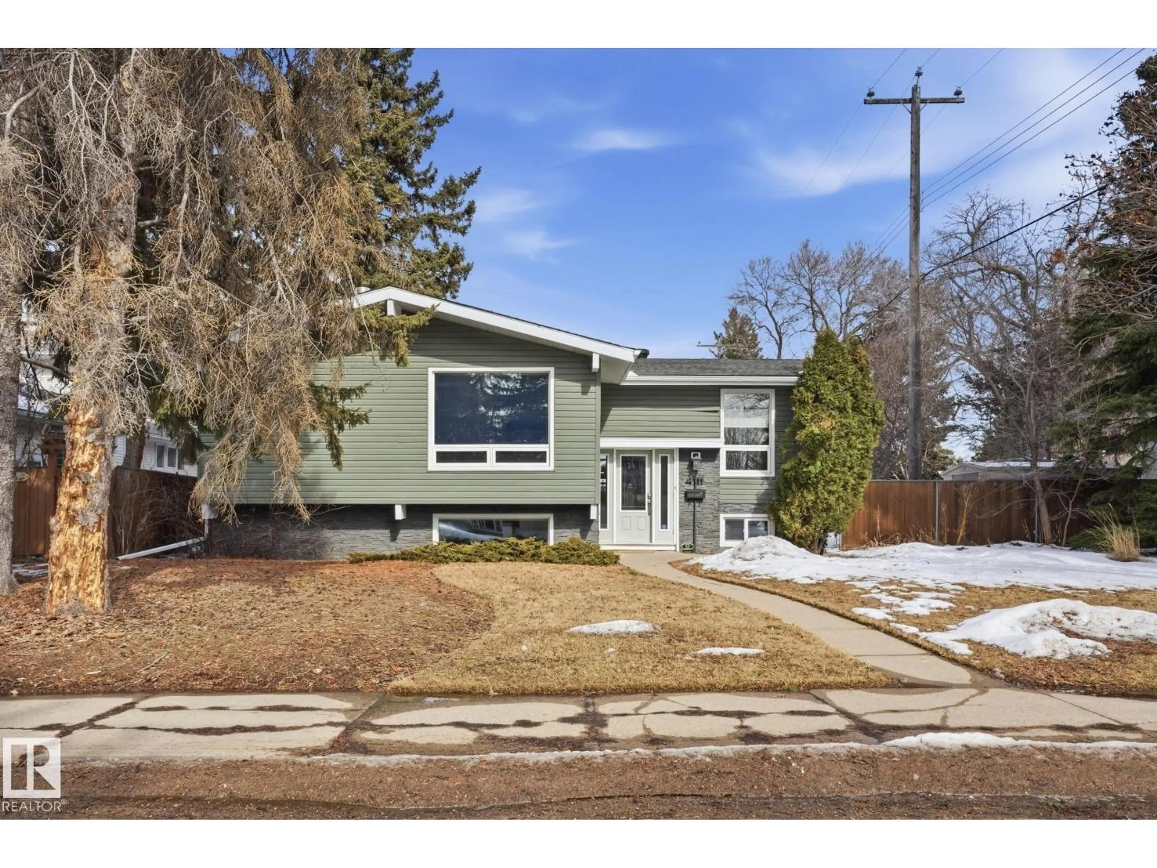 Home with vinyl exterior material, street for NW - 4111 121 ST, Edmonton Alberta T6J1Y6