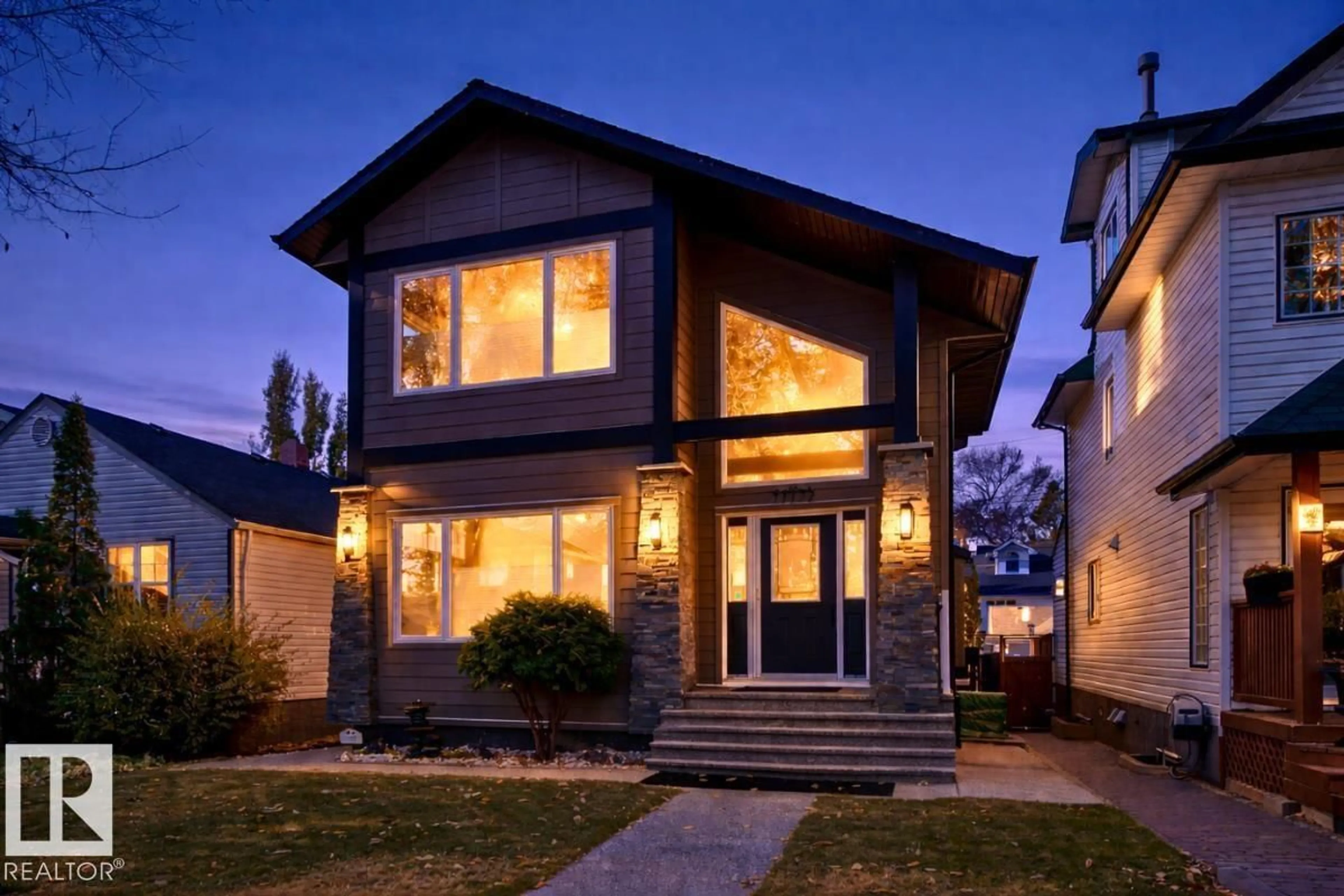 Home with vinyl exterior material, street for NW - 11122 52 ST, Edmonton Alberta T5W3B7