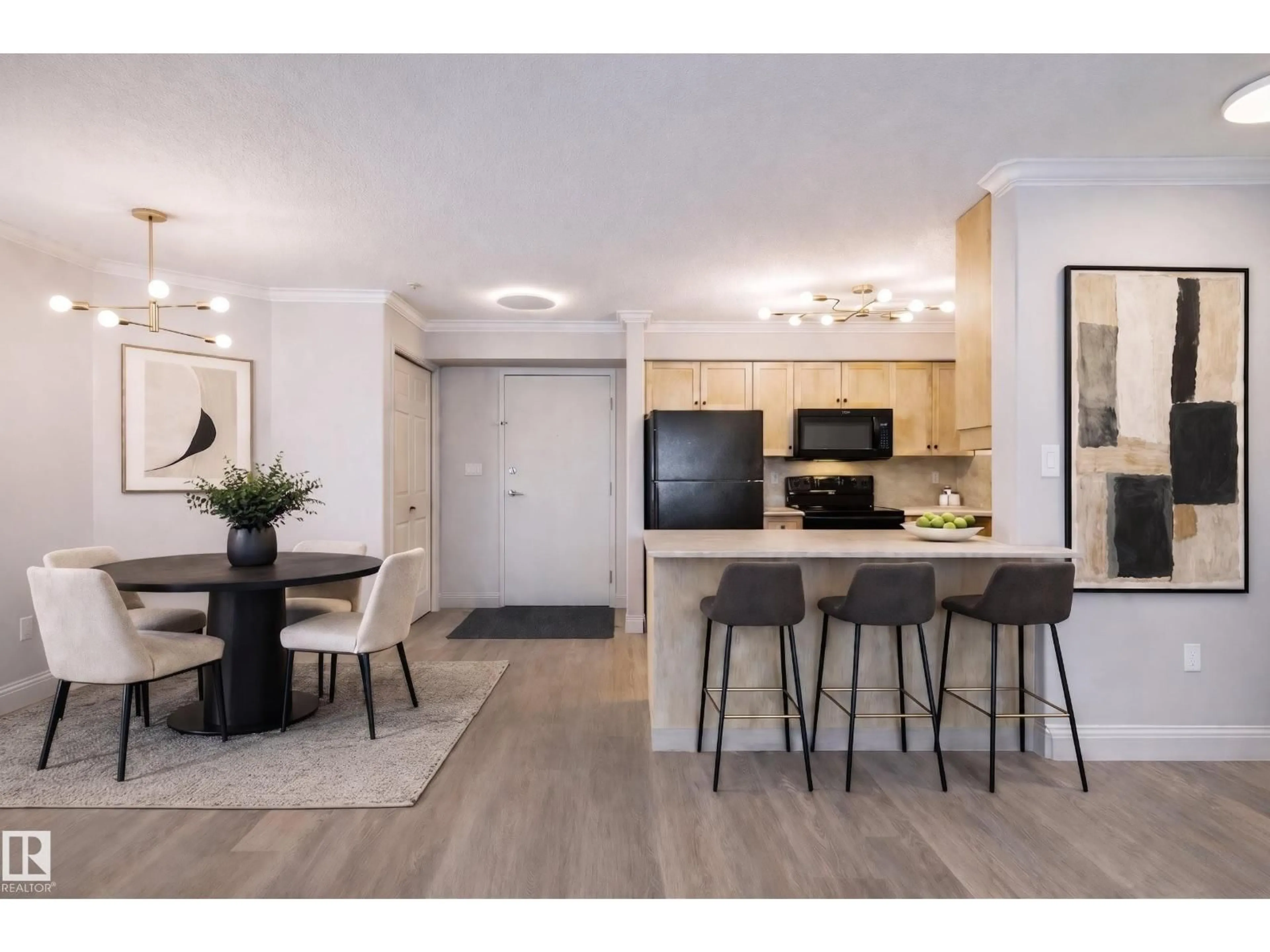 Open concept kitchen, wood/laminate floor for 209 - 14604 125 ST, Edmonton Alberta T5X0B6