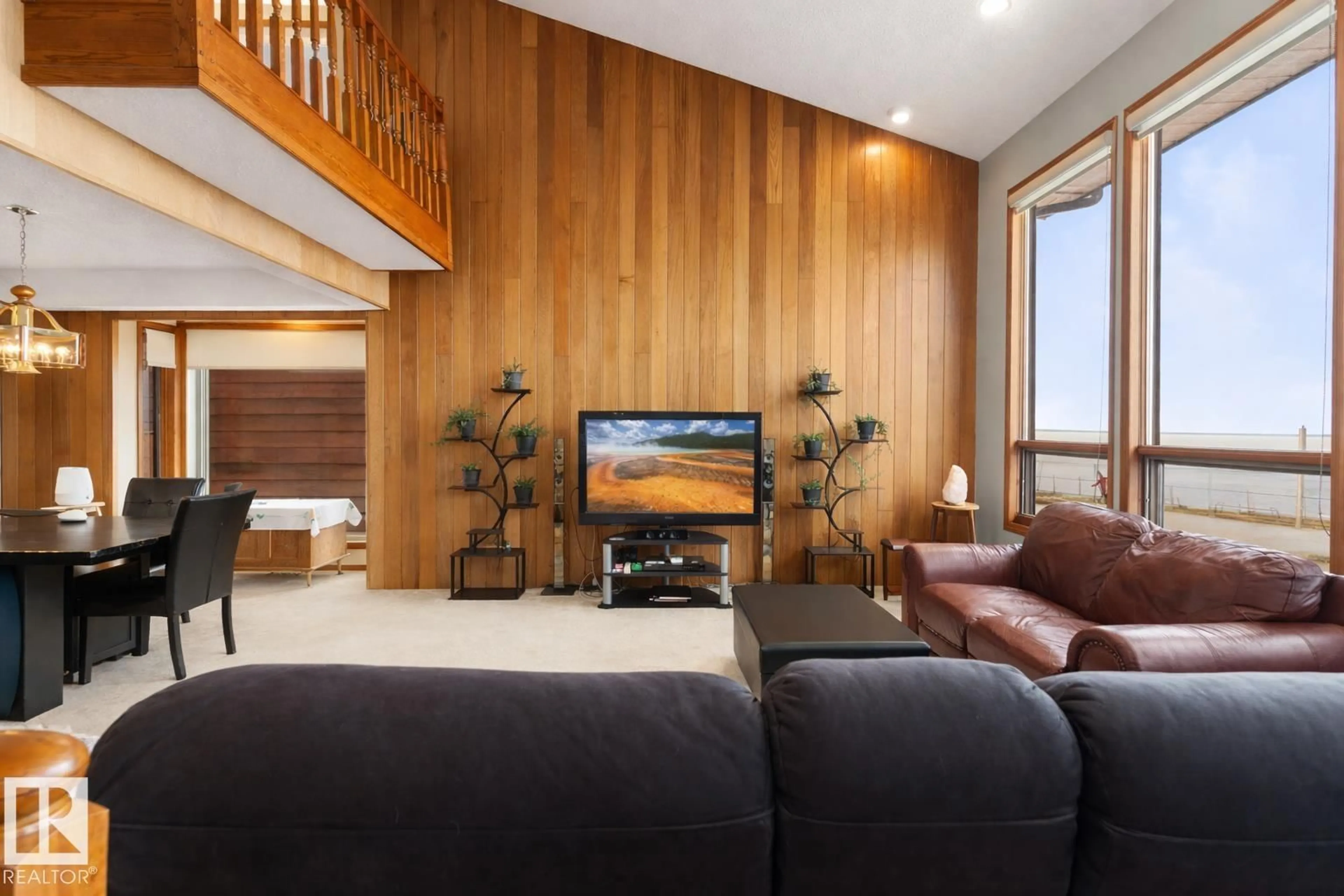 Living room with furniture, wood/laminate floor for 311 LAKESHORE DR, Cold Lake Alberta T9M1A3