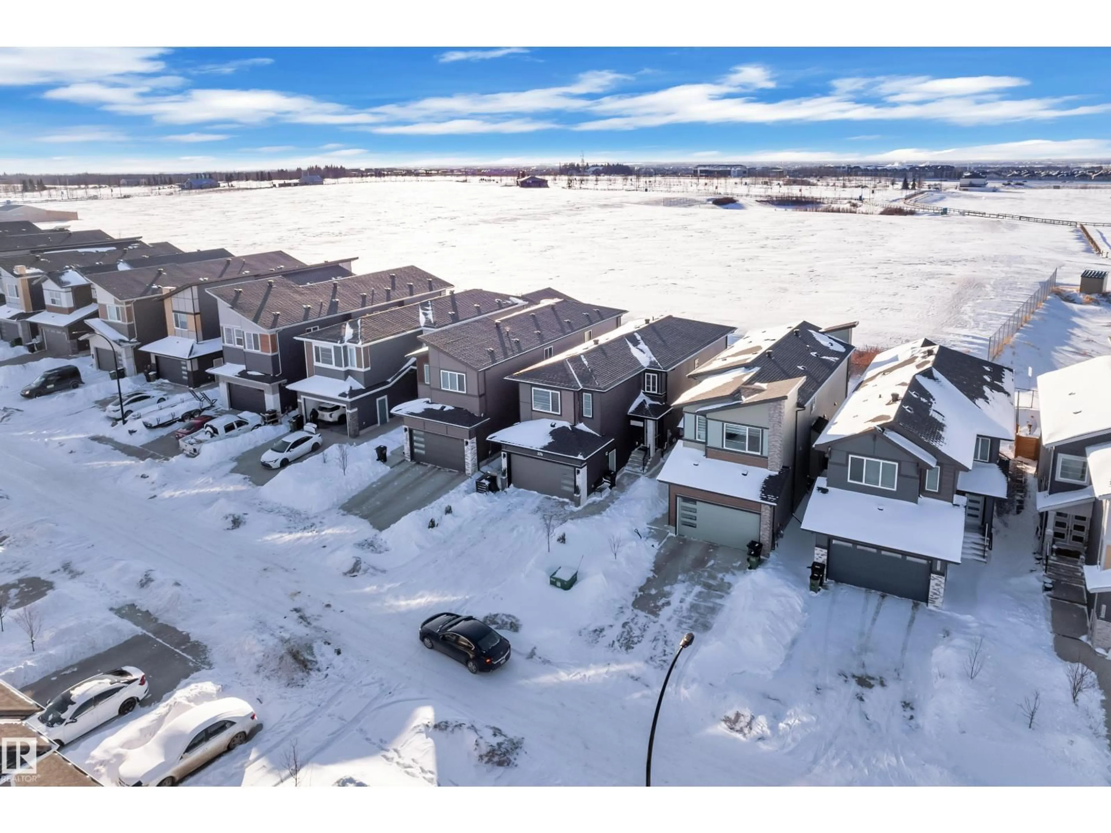 A pic from outside/outdoor area/front of a property/back of a property/a pic from drone, unknown for SW - 316 42 ST, Edmonton Alberta T6X3A2