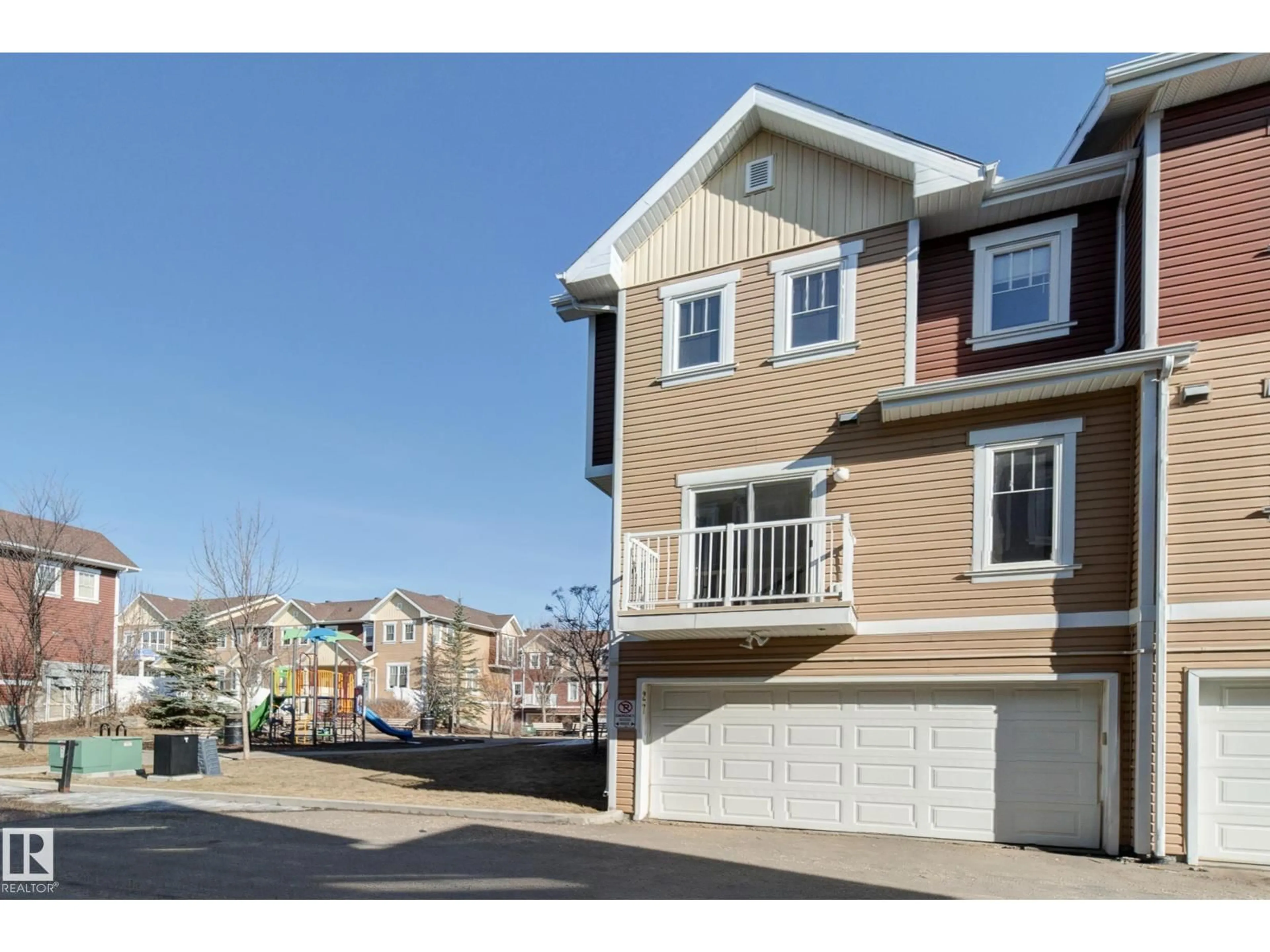 Home with vinyl exterior material, street for #27 - 1623 TOWNE CENTRE BV, Edmonton Alberta T6R0S3