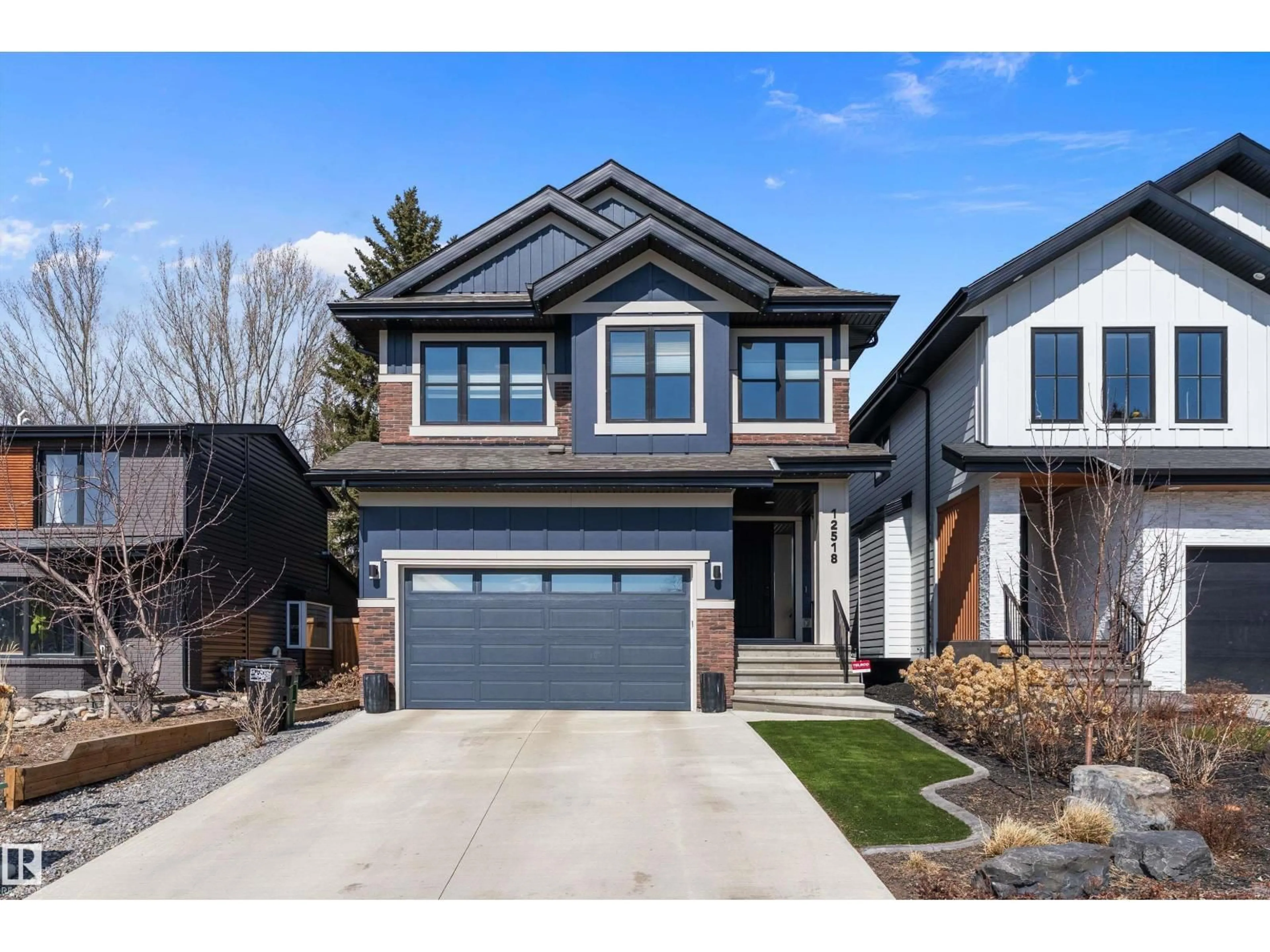 Home with brick exterior material, street for 12518 39 AV, Edmonton Alberta T6J0N2