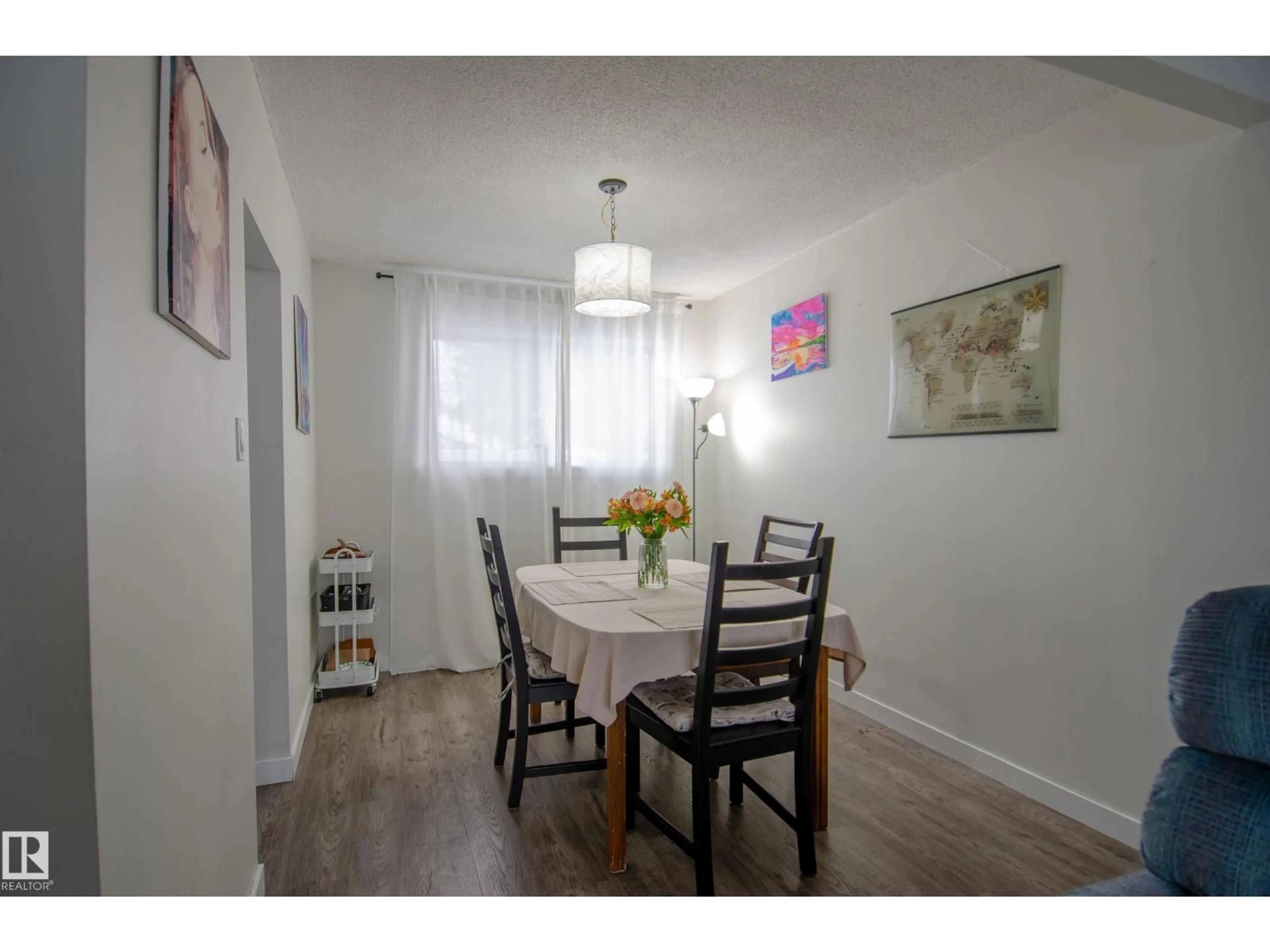 Dining room, wood/laminate floor for 12904 90 ST, Edmonton Alberta T5E3L8