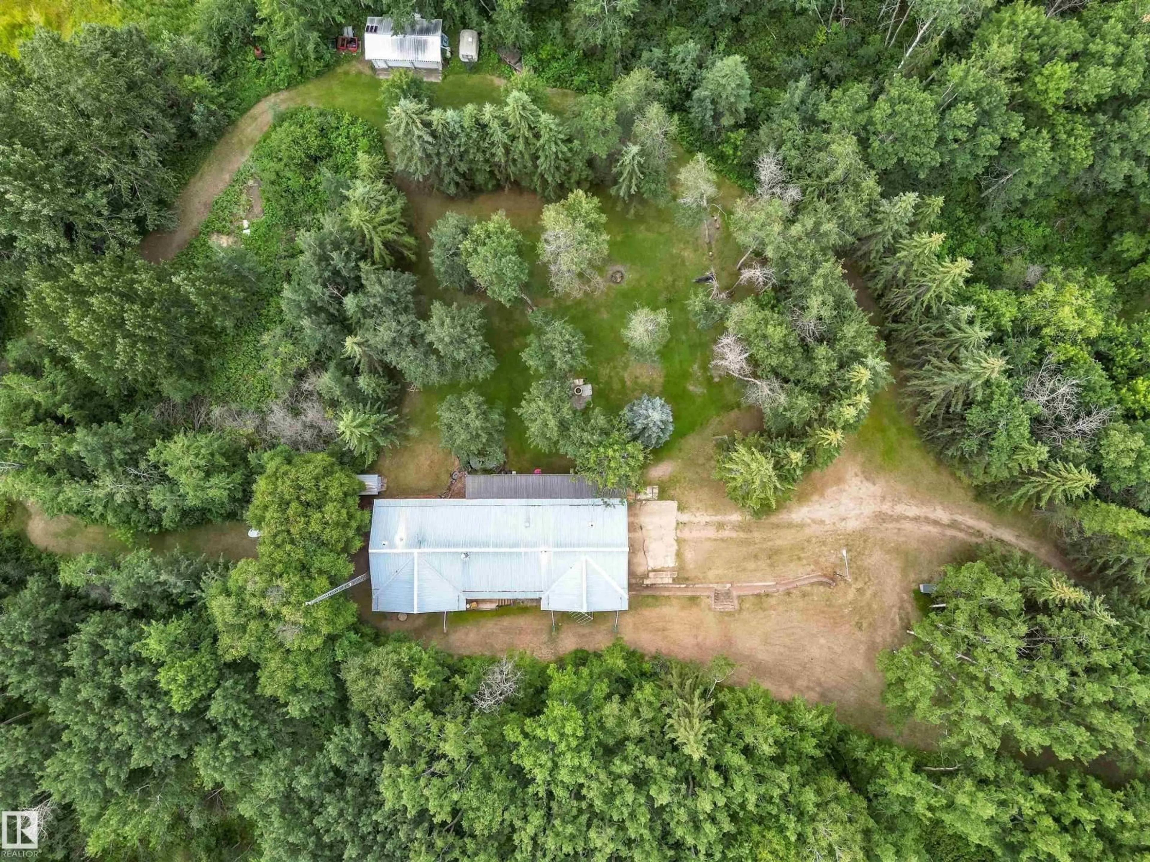 A pic from outside/outdoor area/front of a property/back of a property/a pic from drone, forest/trees view for 5 - 51119 RGE ROAD 265, Rural Parkland County Alberta T7Y1E8