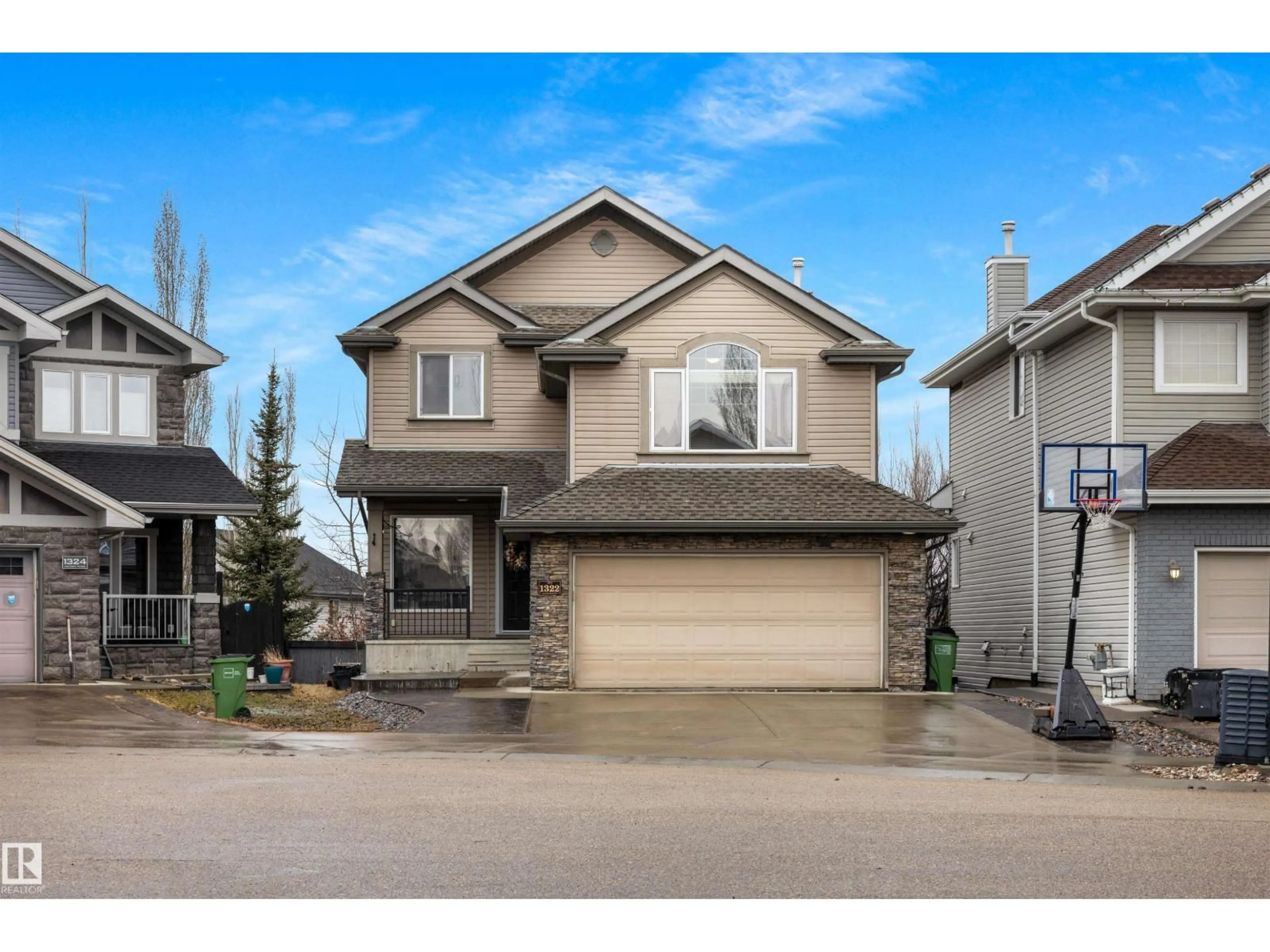 Home with vinyl exterior material, street for 1322 MALONE PL, Edmonton Alberta T6R0G6