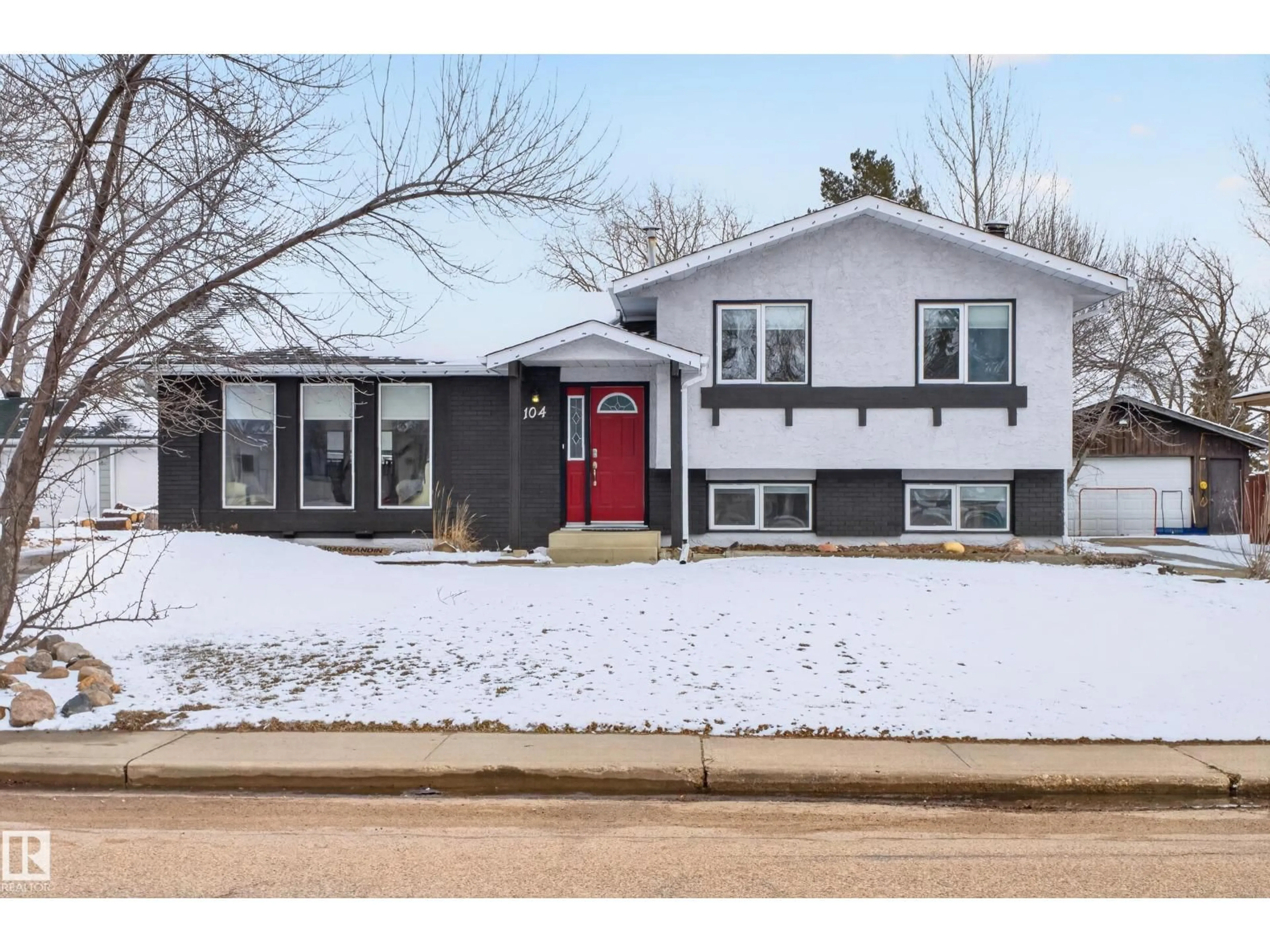 Home with vinyl exterior material, street for 104 GRANDIN DR, Morinville Alberta T8R1H5
