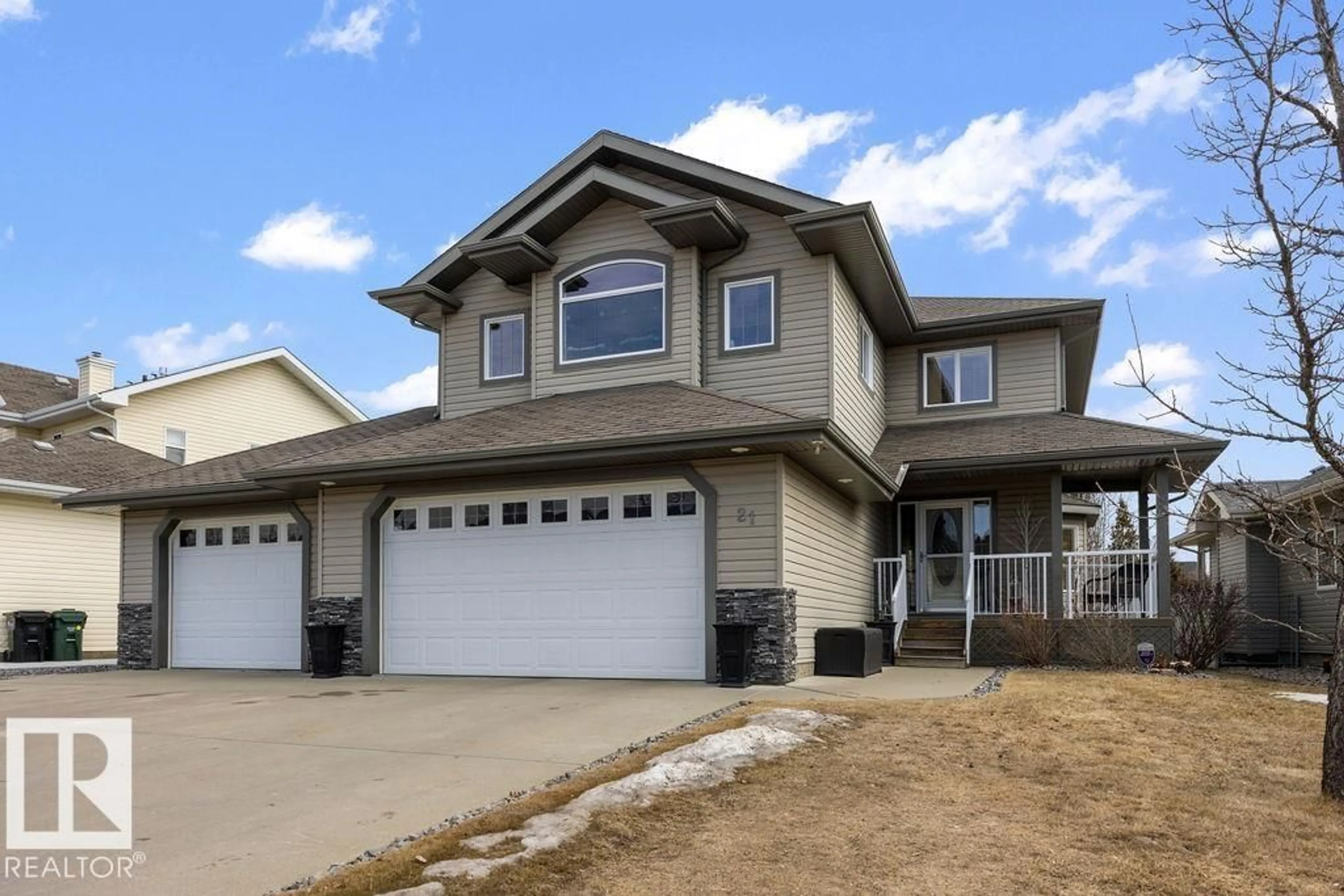 Home with vinyl exterior material, street for 21 CREEKSIDE DR, Ardrossan Alberta T8E1J6
