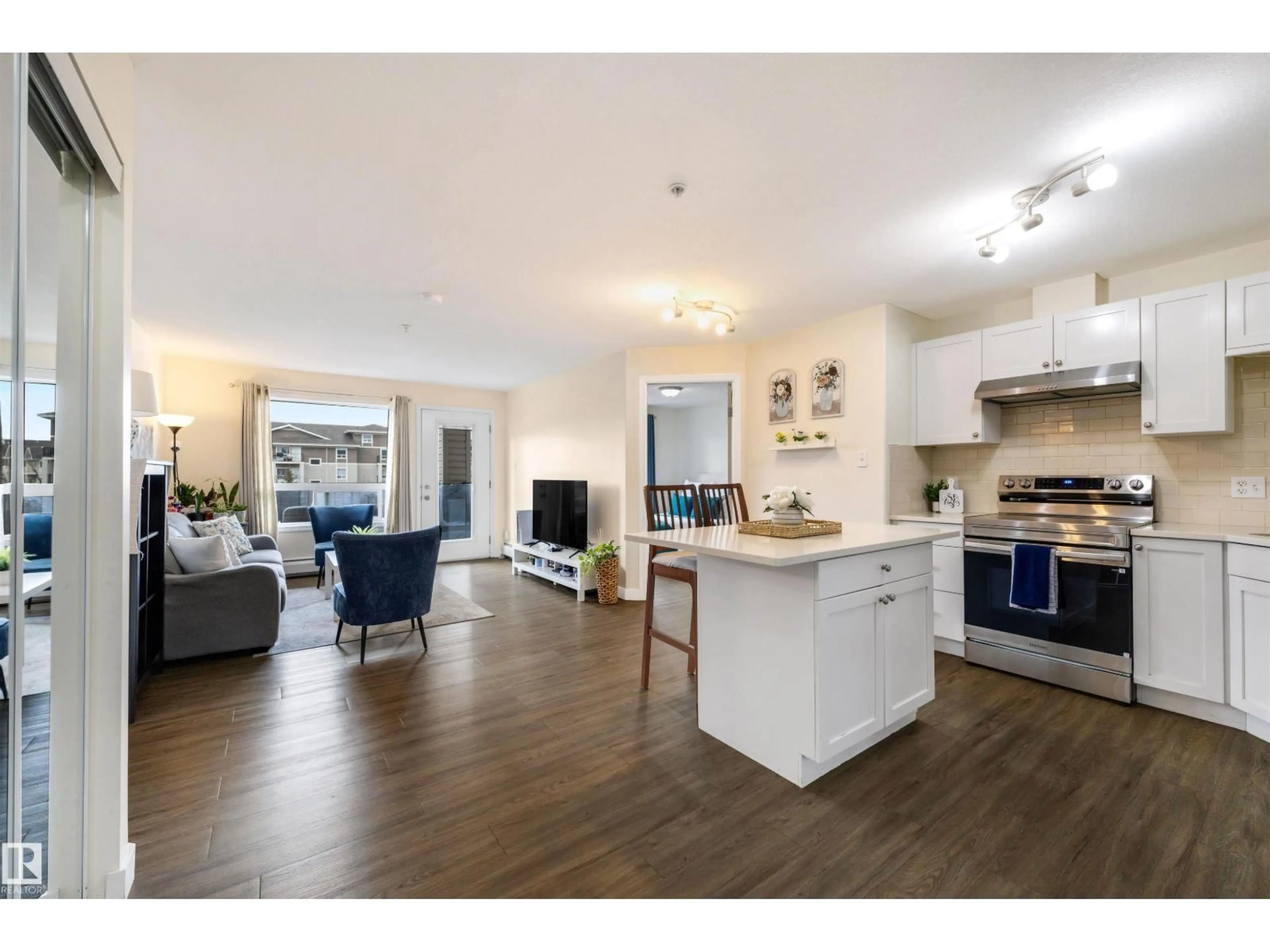 Open concept kitchen, wood/laminate floor for 5306 SOUTH TERWILLEGAR DR, Edmonton Alberta T6R0M1