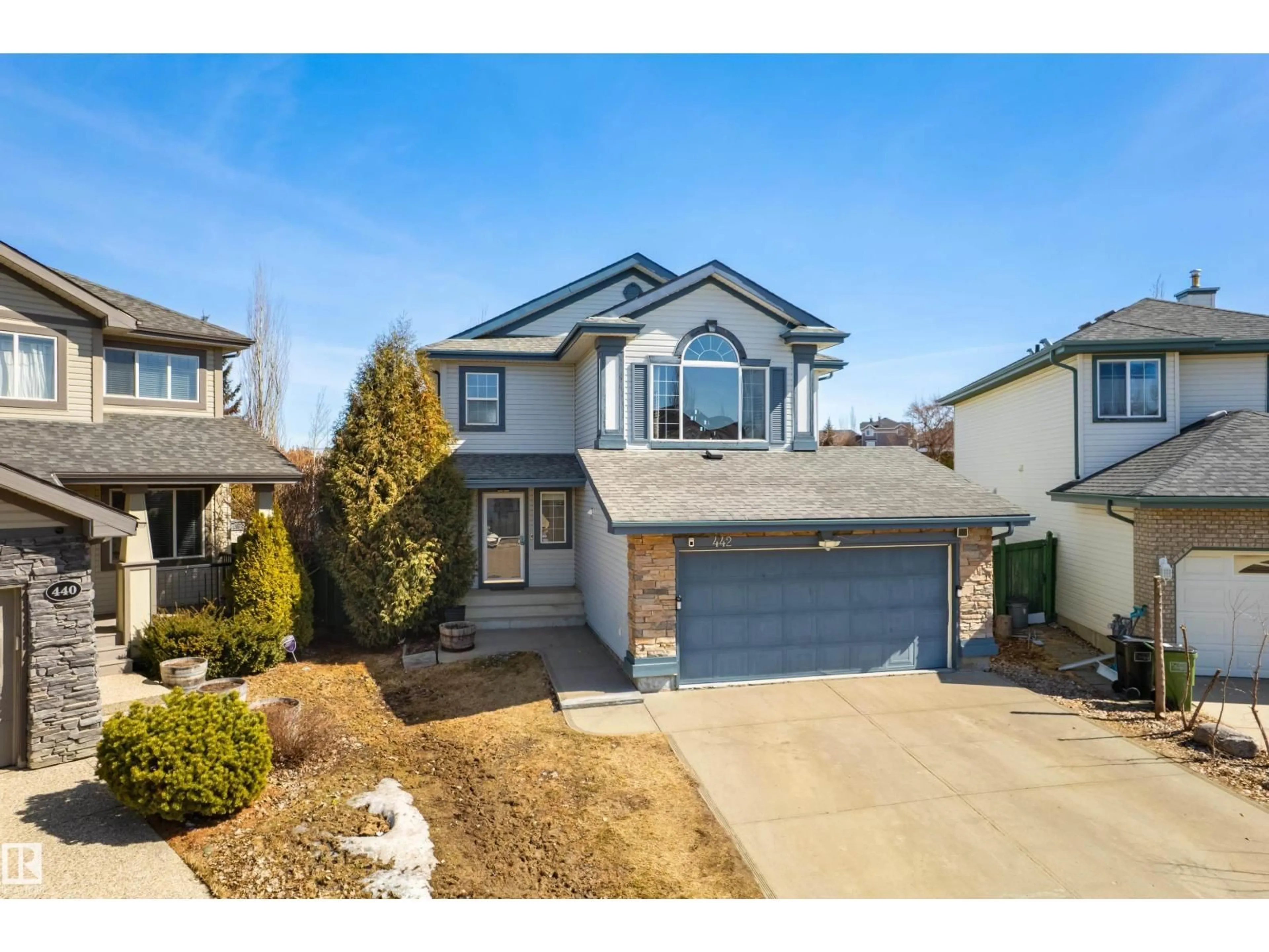 Home with vinyl exterior material, street for 442 HUNTERS GR, Edmonton Alberta T6R3C1