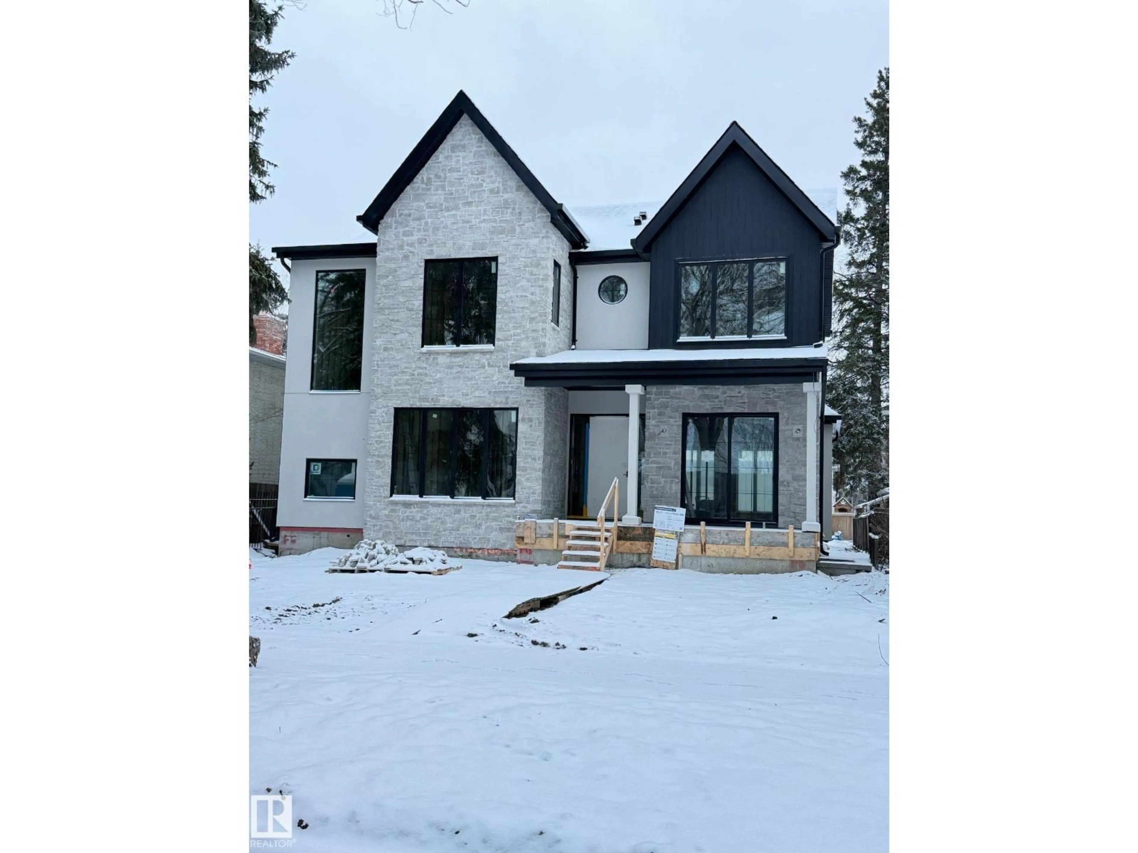 Home with brick exterior material, street for NW - 10223 130 ST, Edmonton Alberta T5N1X4