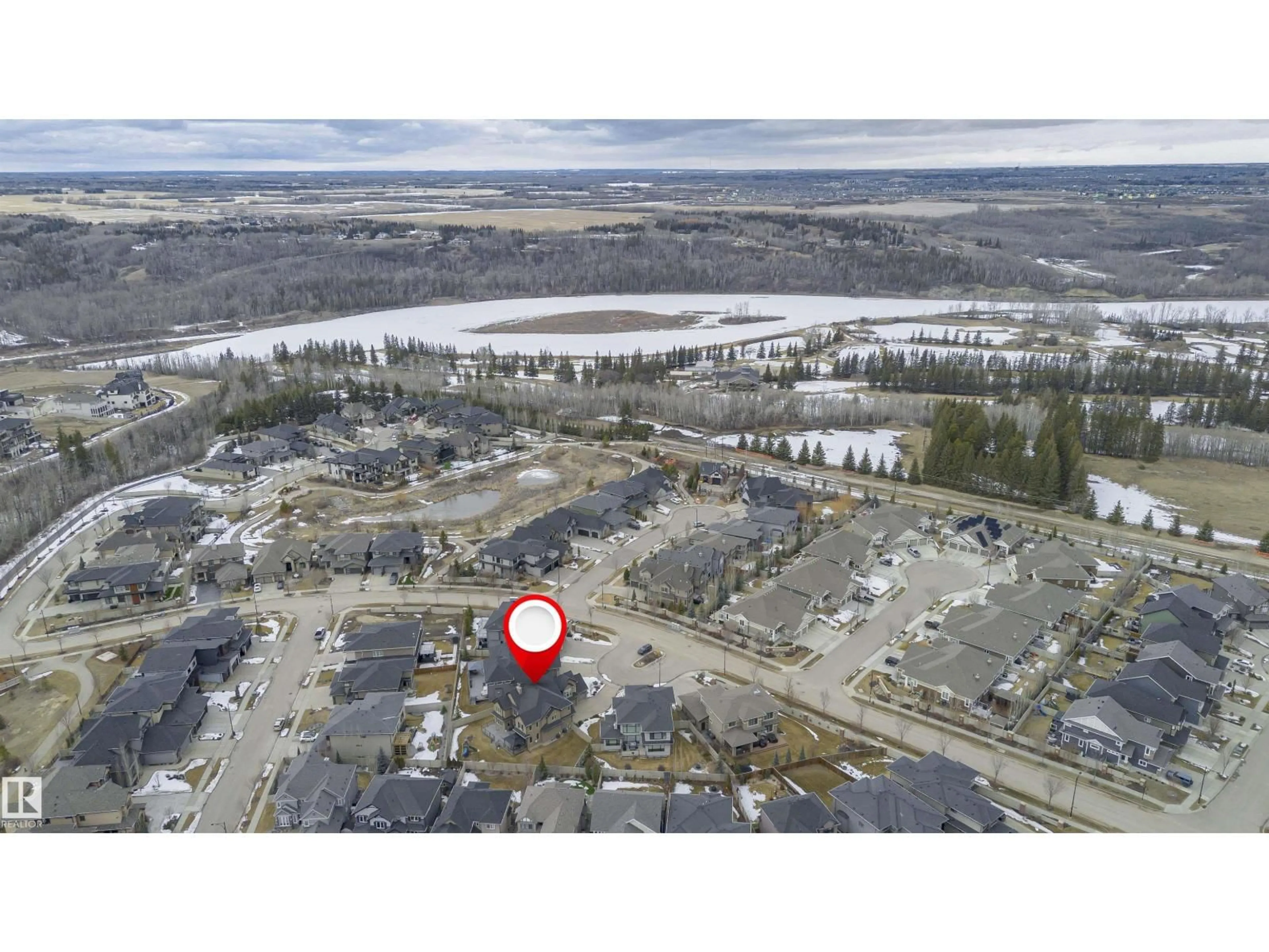 A pic from outside/outdoor area/front of a property/back of a property/a pic from drone, water/lake/river/ocean view for 3435 KESWICK BV, Edmonton Alberta T6W3B2