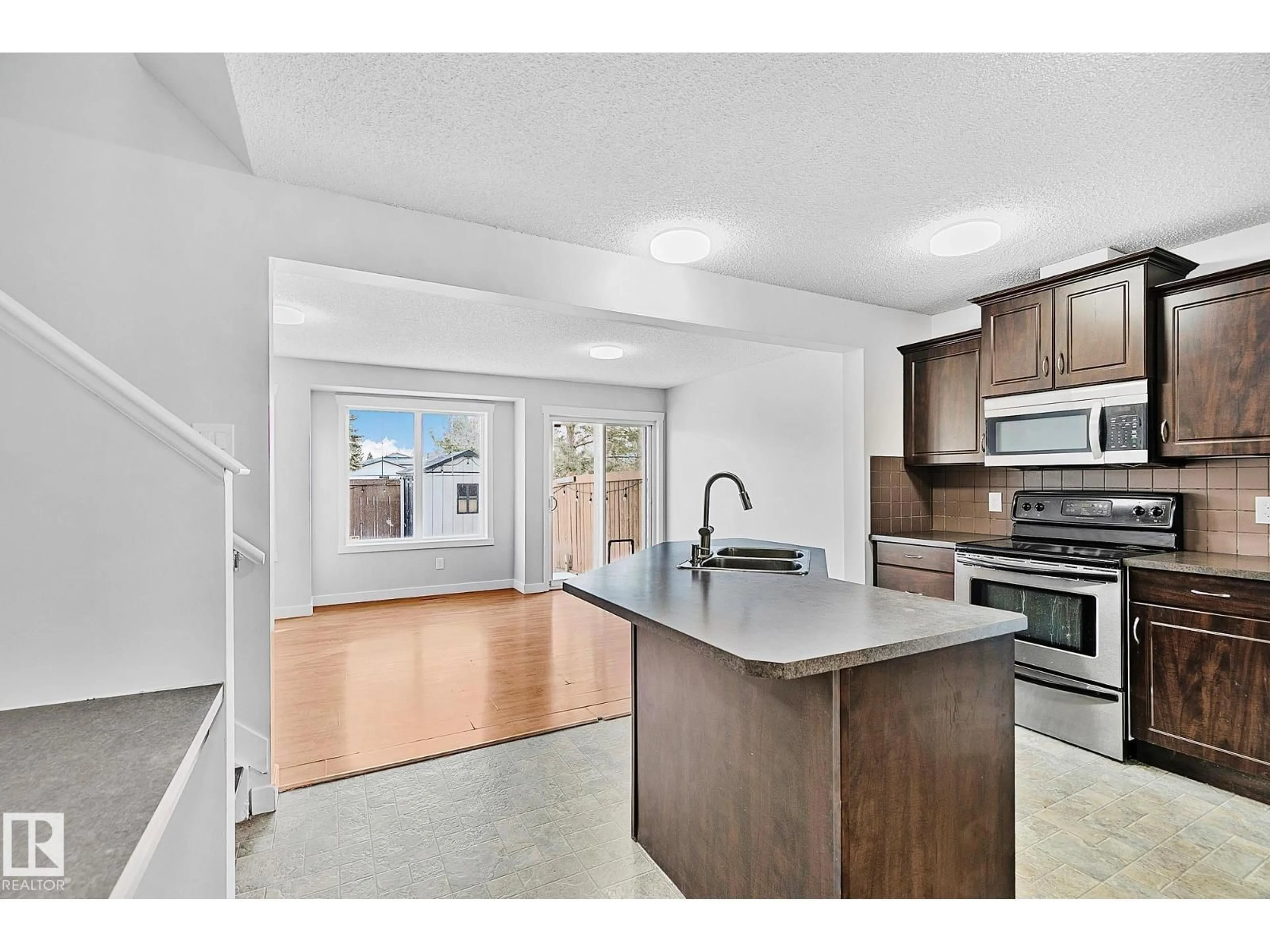 Open concept kitchen, unknown for #88 - 14208 36 ST, Edmonton Alberta T5Y0E4