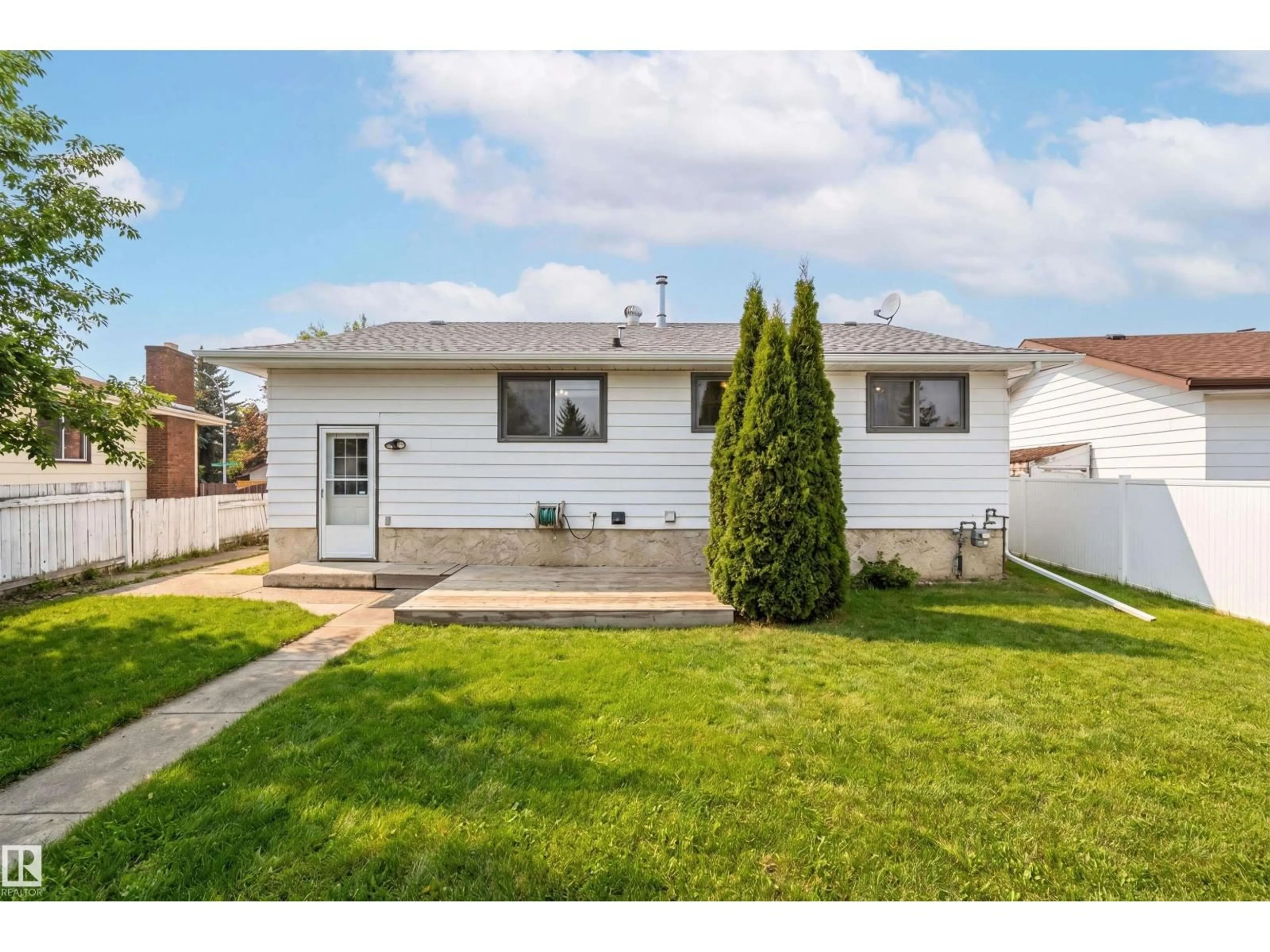 Home with vinyl exterior material, street for 1707 65 ST, Edmonton Alberta T6L1N1