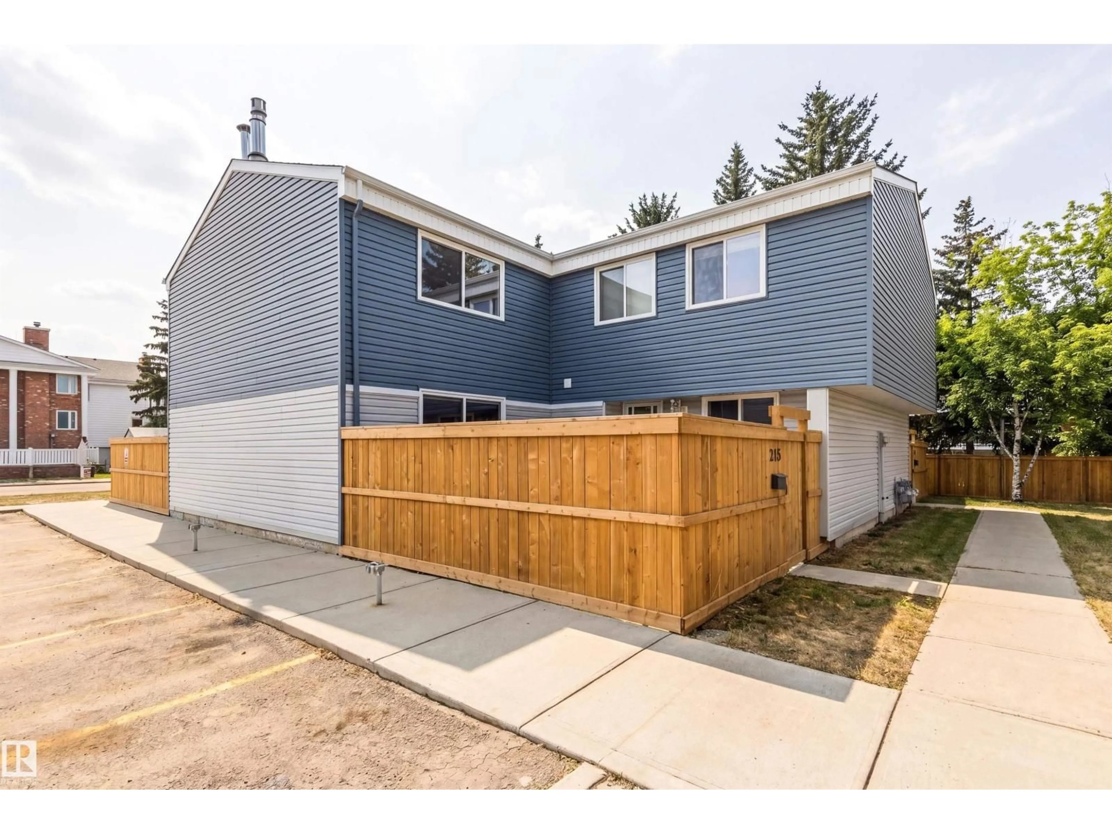 Home with vinyl exterior material, street for 14707 - 218 53 AV NW, Edmonton Alberta T6H5C9
