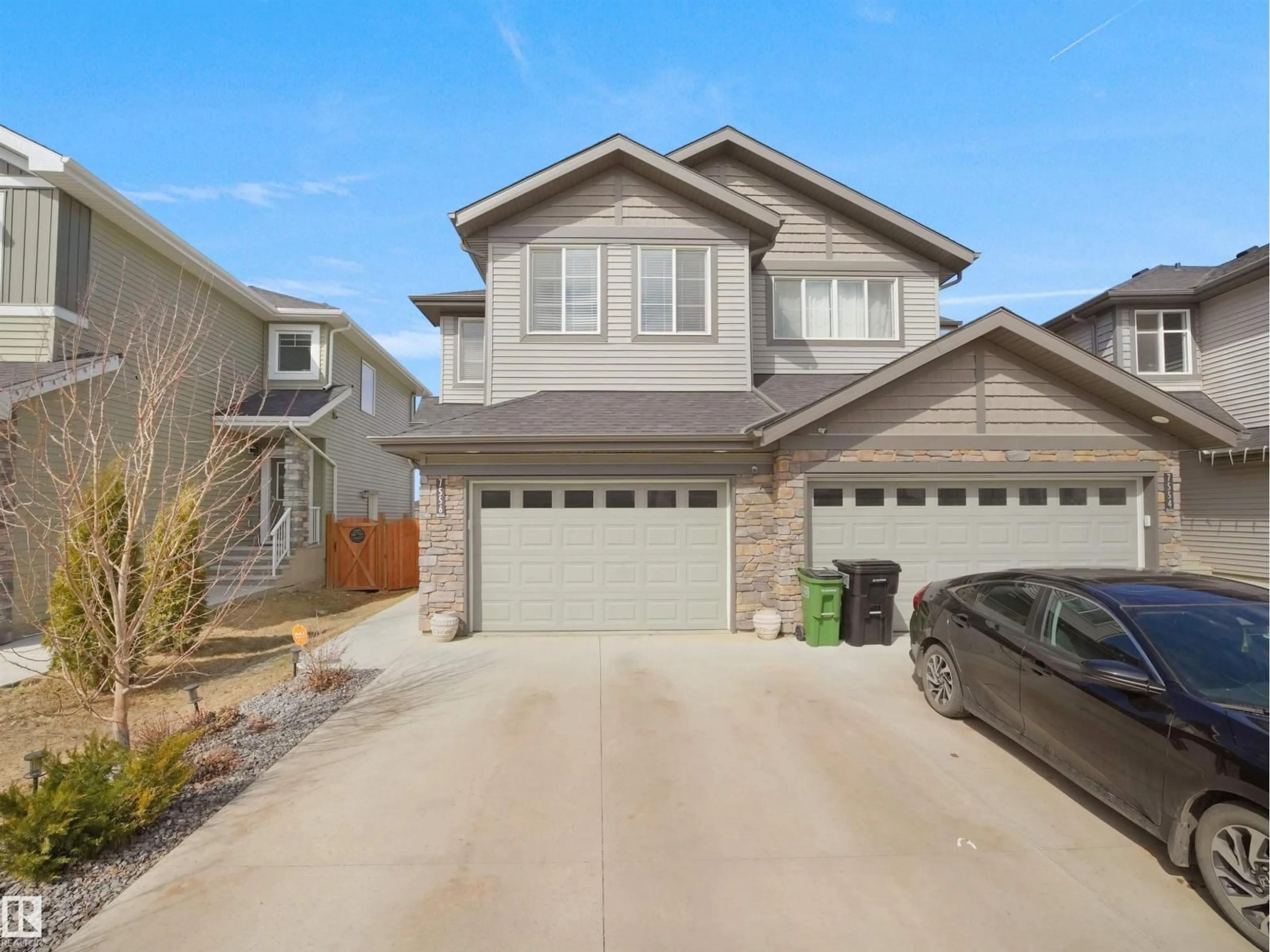 Home with vinyl exterior material, street for 7556 CREIGHTON PL, Edmonton Alberta T6W3Z6