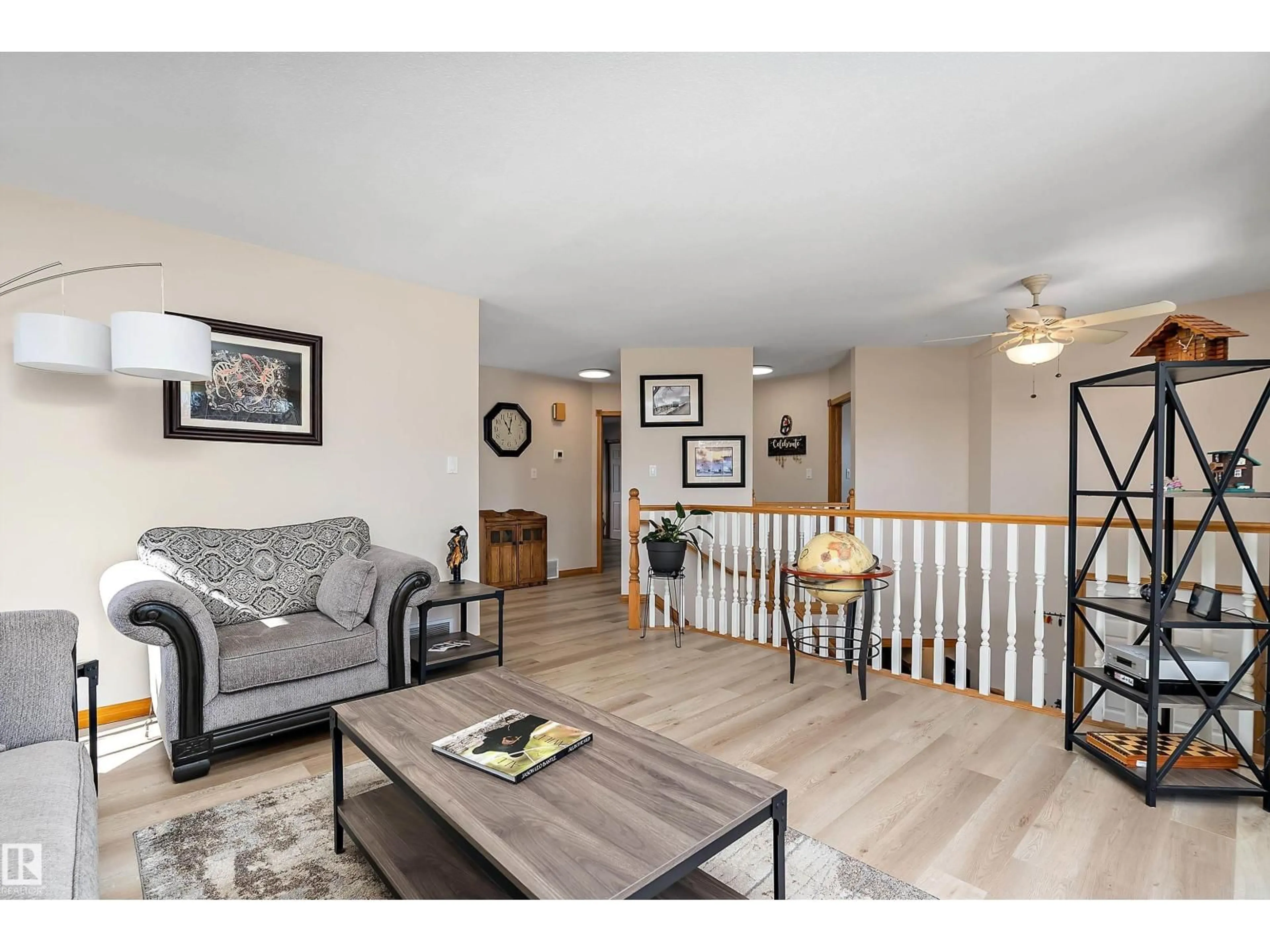 Living room with furniture, wood/laminate floor for 121 DUFFERIN ST, St. Albert Alberta T8N6G7