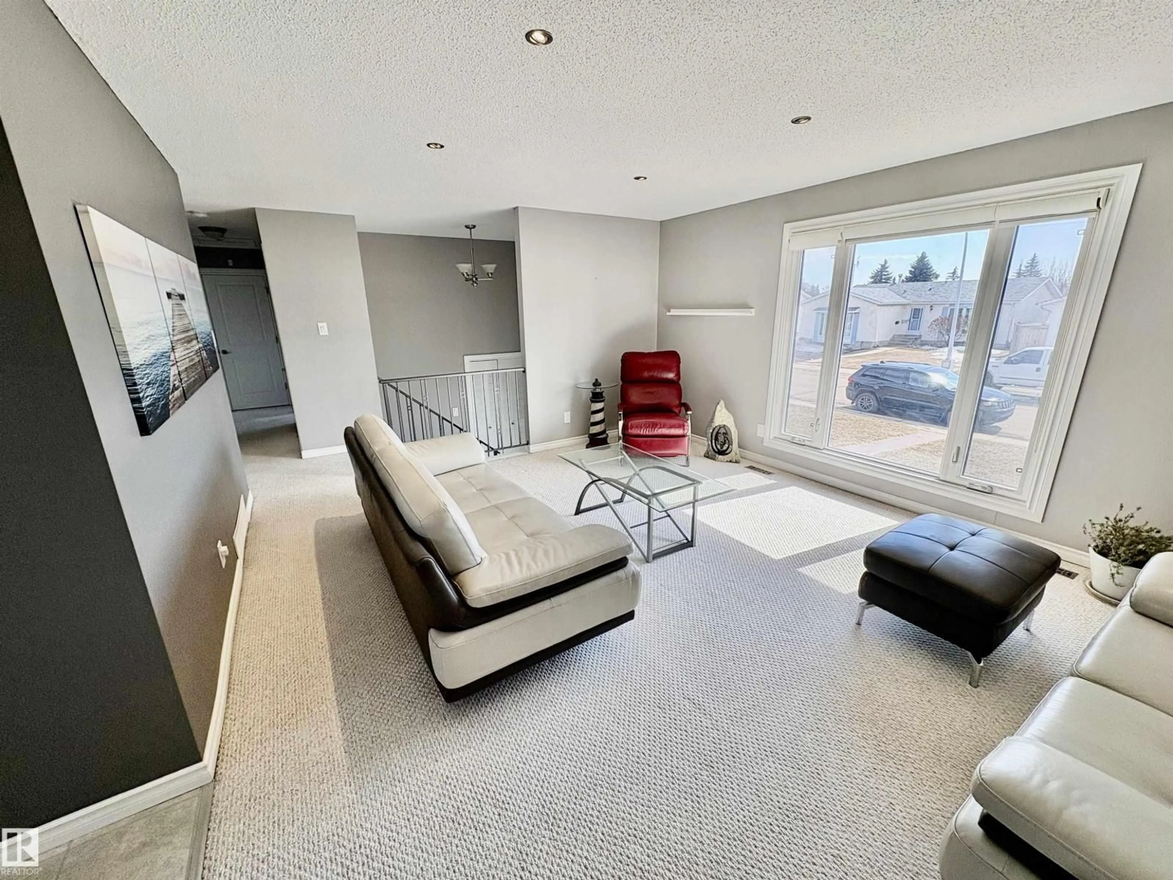 Living room with furniture, unknown for 11424 164 AV, Edmonton Alberta T5X3W2