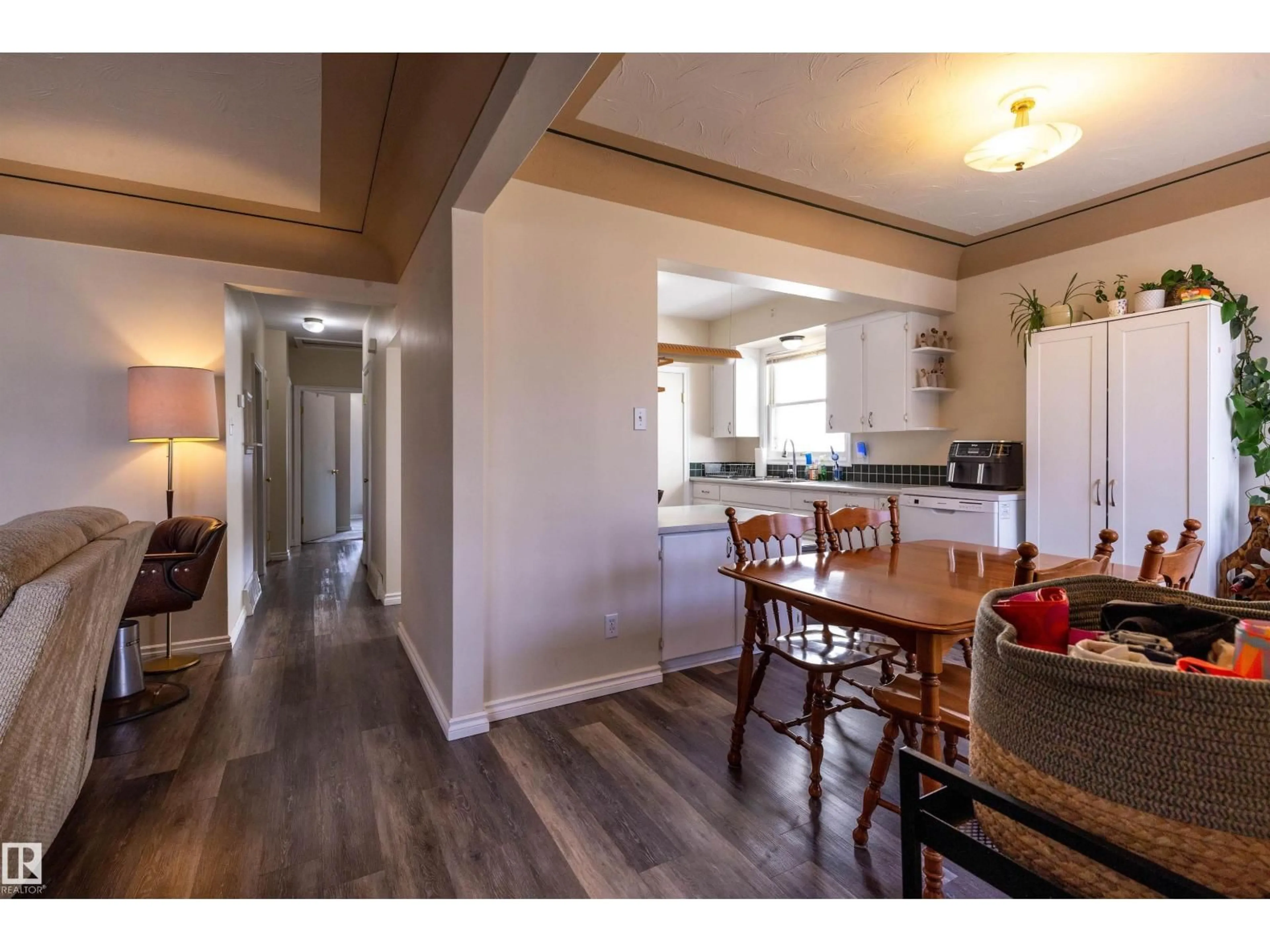 Open concept kitchen, wood/laminate floor for NW - 9214 92 ST, Edmonton Alberta T6C3R5