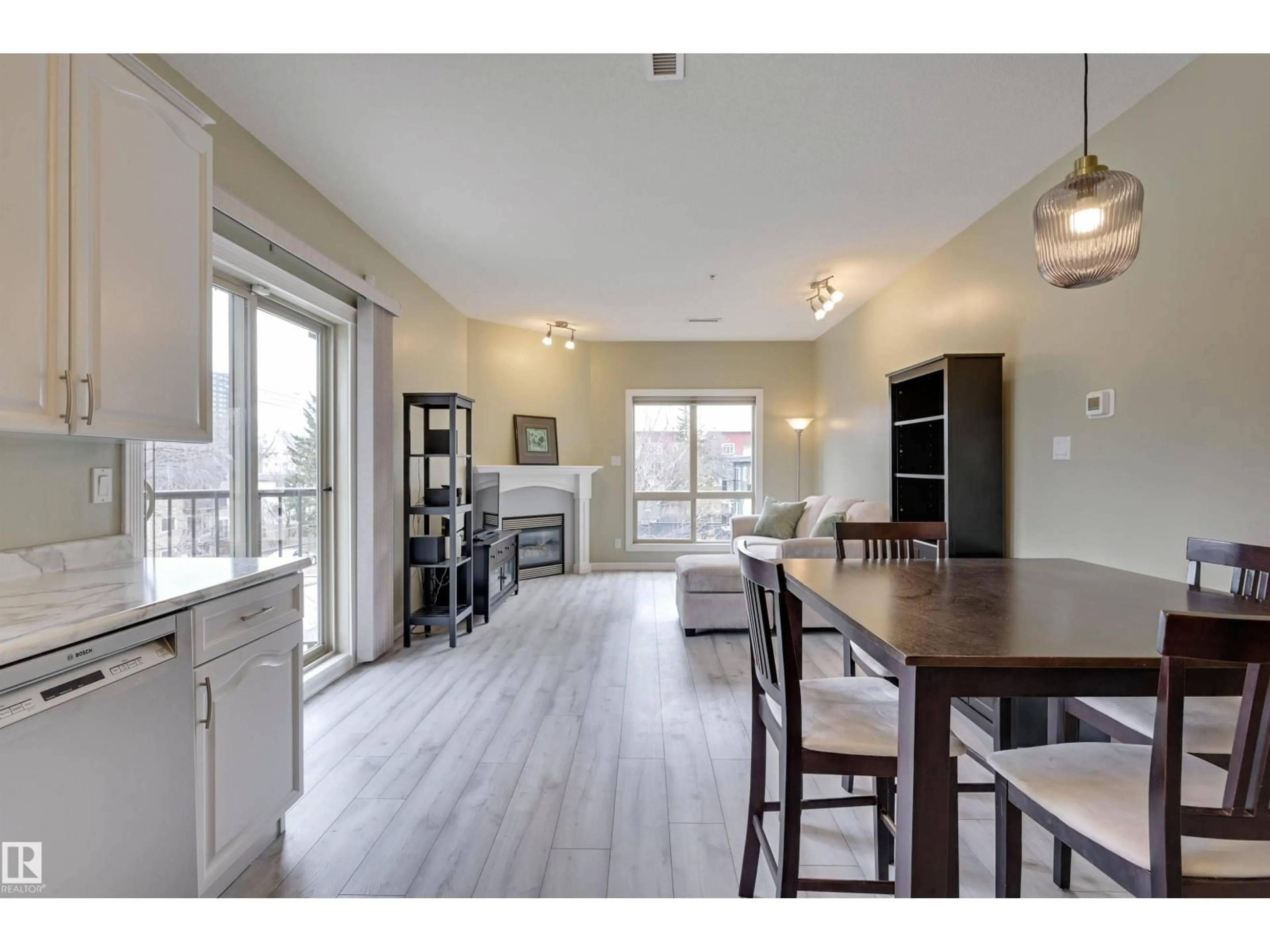 Open concept kitchen, wood/laminate floor for #302 - 10630 78 AV, Edmonton Alberta T6E1P5