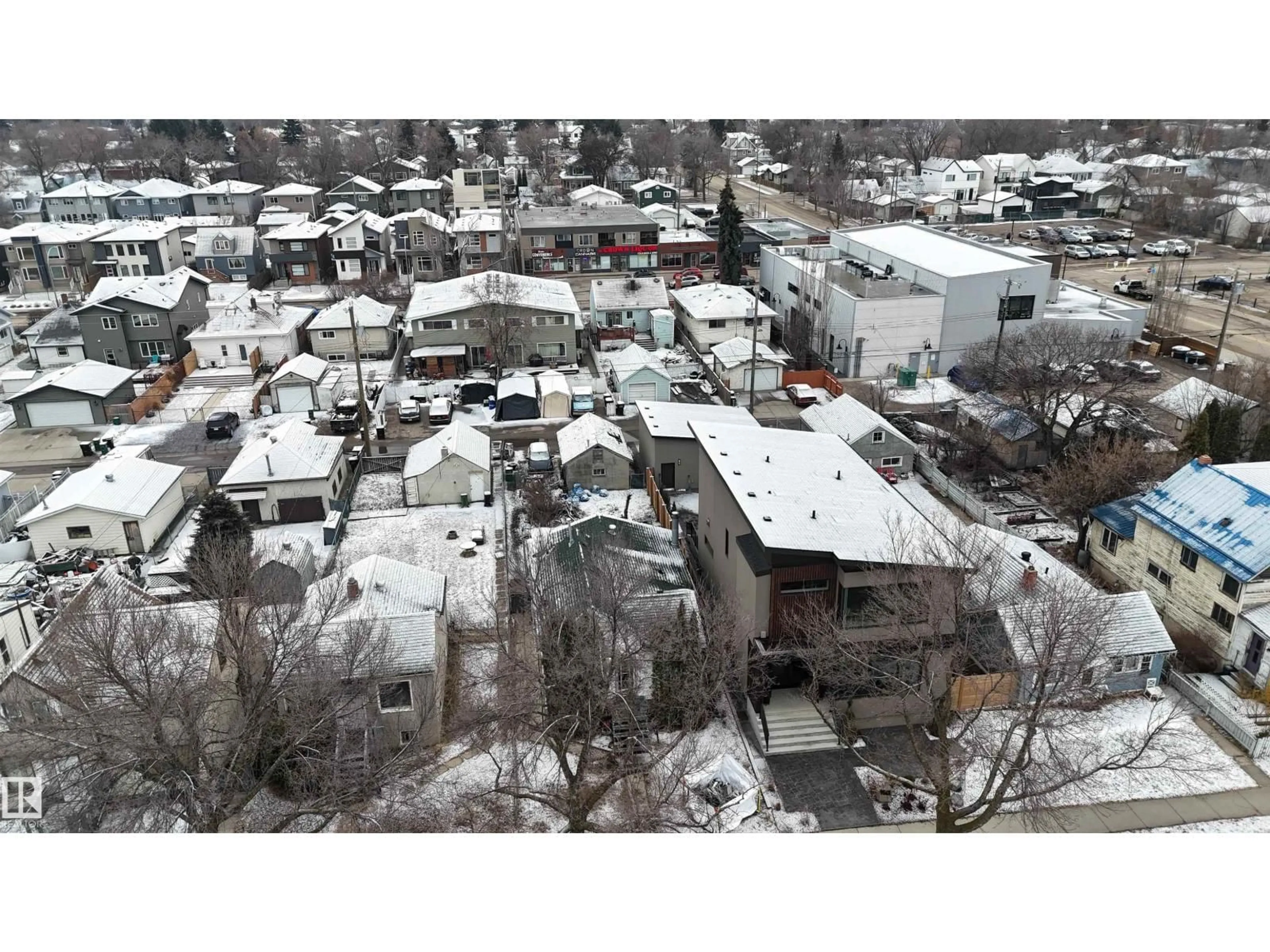 A pic from outside/outdoor area/front of a property/back of a property/a pic from drone, unknown for 9541 77 AV, Edmonton Alberta T6C2M5