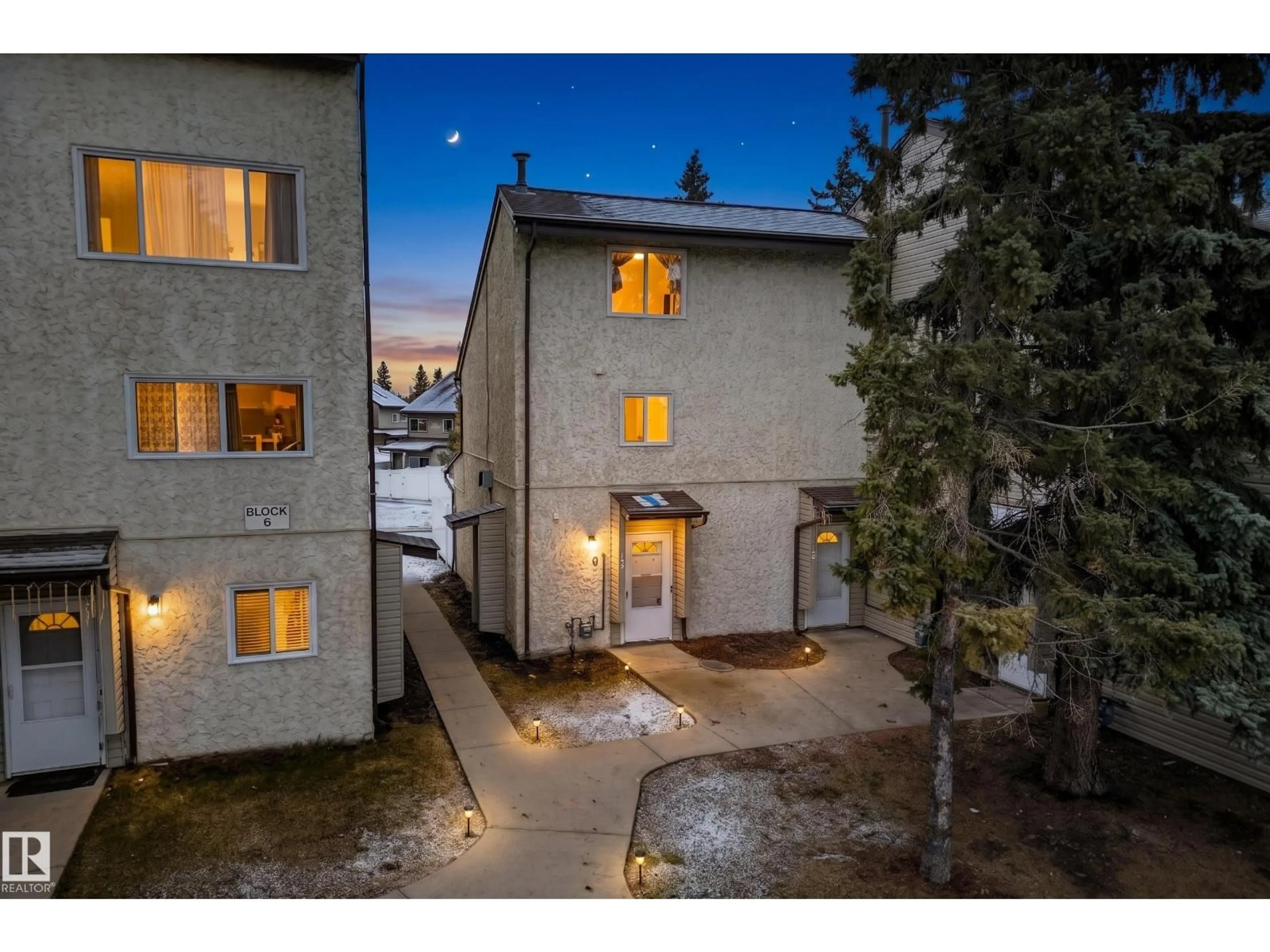 A pic from outside/outdoor area/front of a property/back of a property/a pic from drone, street for NW - 5A MEADOWLARK VG, Edmonton Alberta T5R3X3