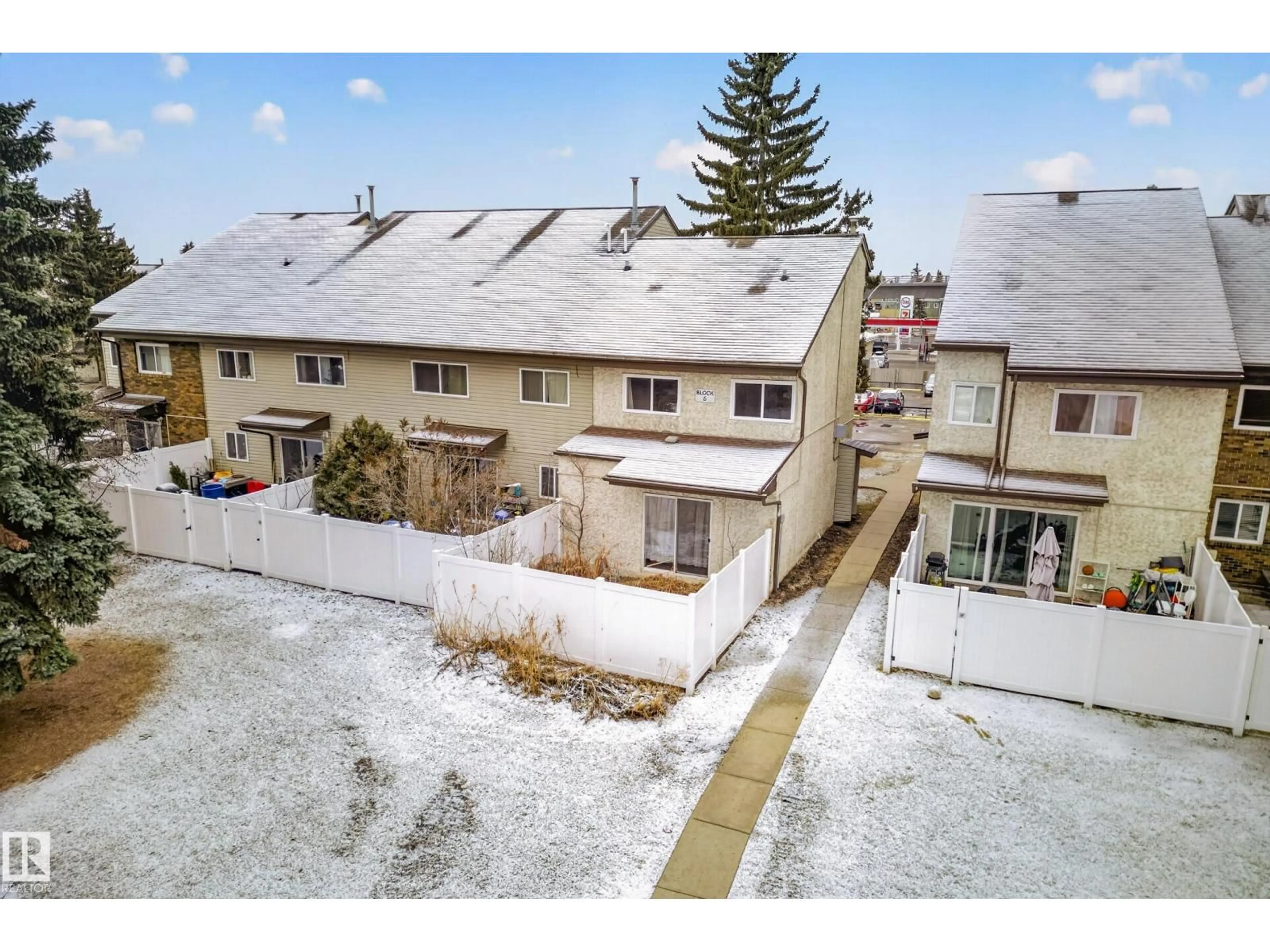 A pic from outside/outdoor area/front of a property/back of a property/a pic from drone, street for NW - 5A MEADOWLARK VG, Edmonton Alberta T5R3X3
