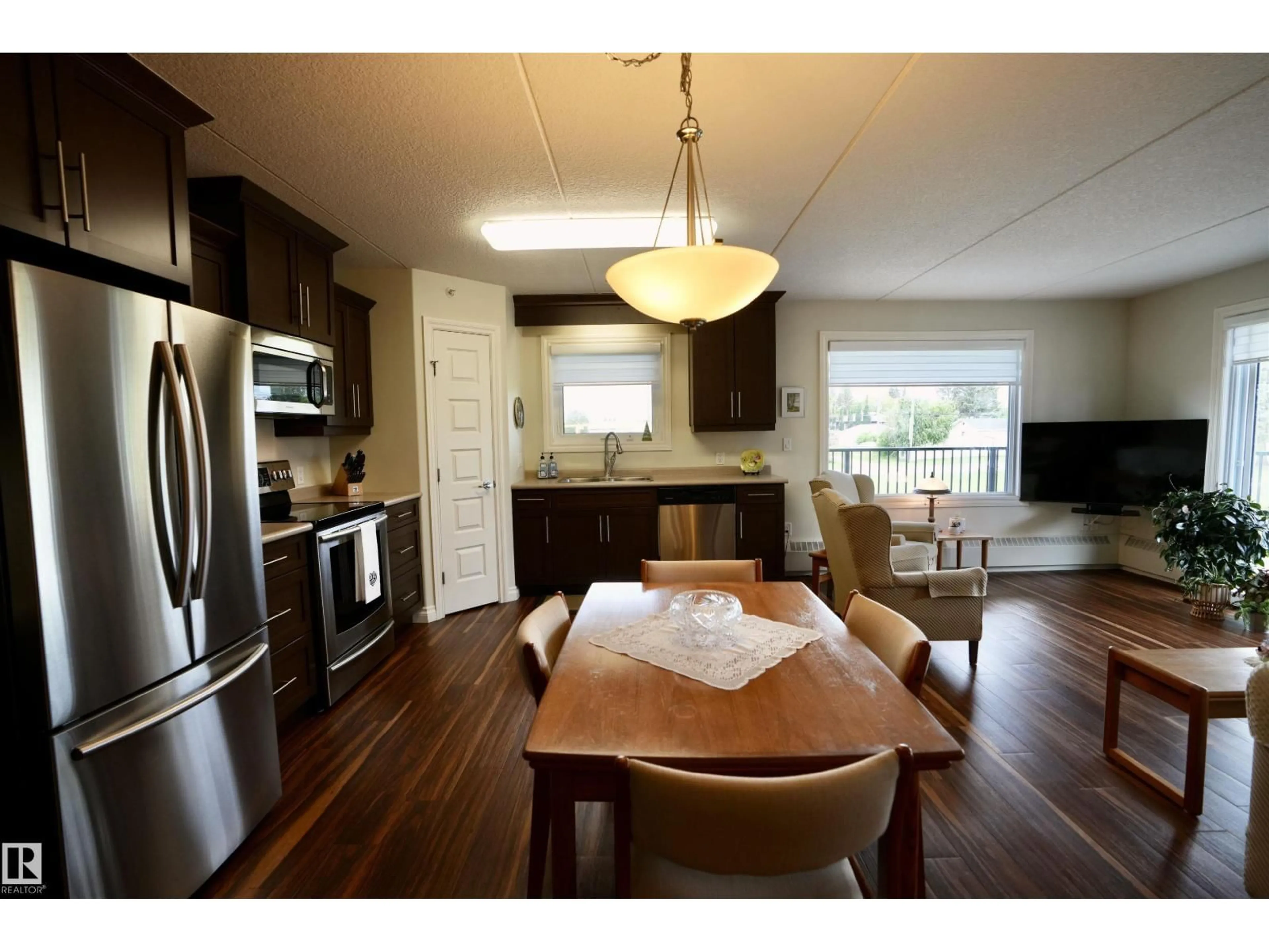 Open concept kitchen, wood/laminate floor for 204 - 4614A LAKESHORE DRIVE, St. Paul Town Alberta T0A3A3