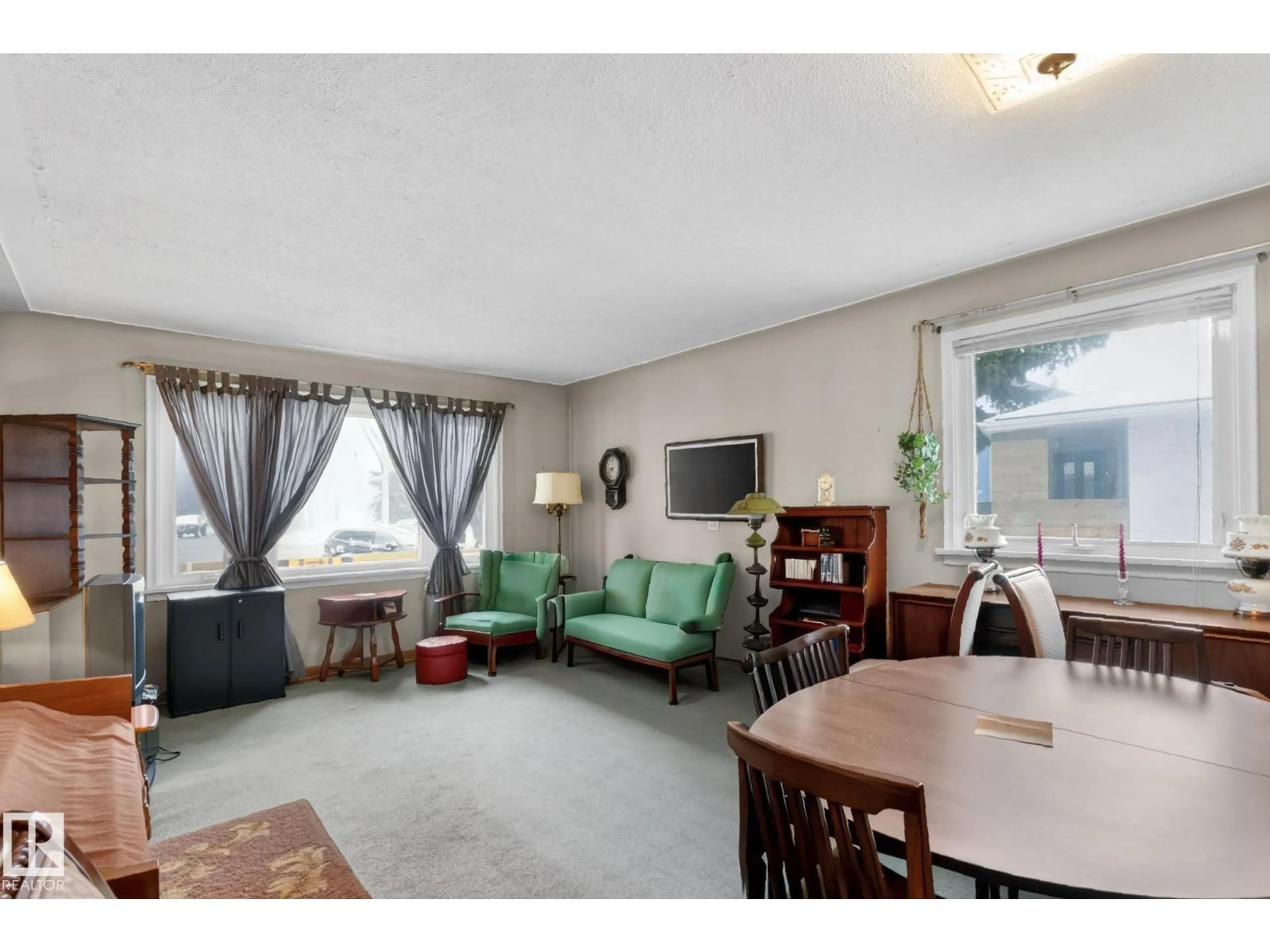 Living room with furniture, unknown for 11255 71 AV, Edmonton Alberta T6G0A5