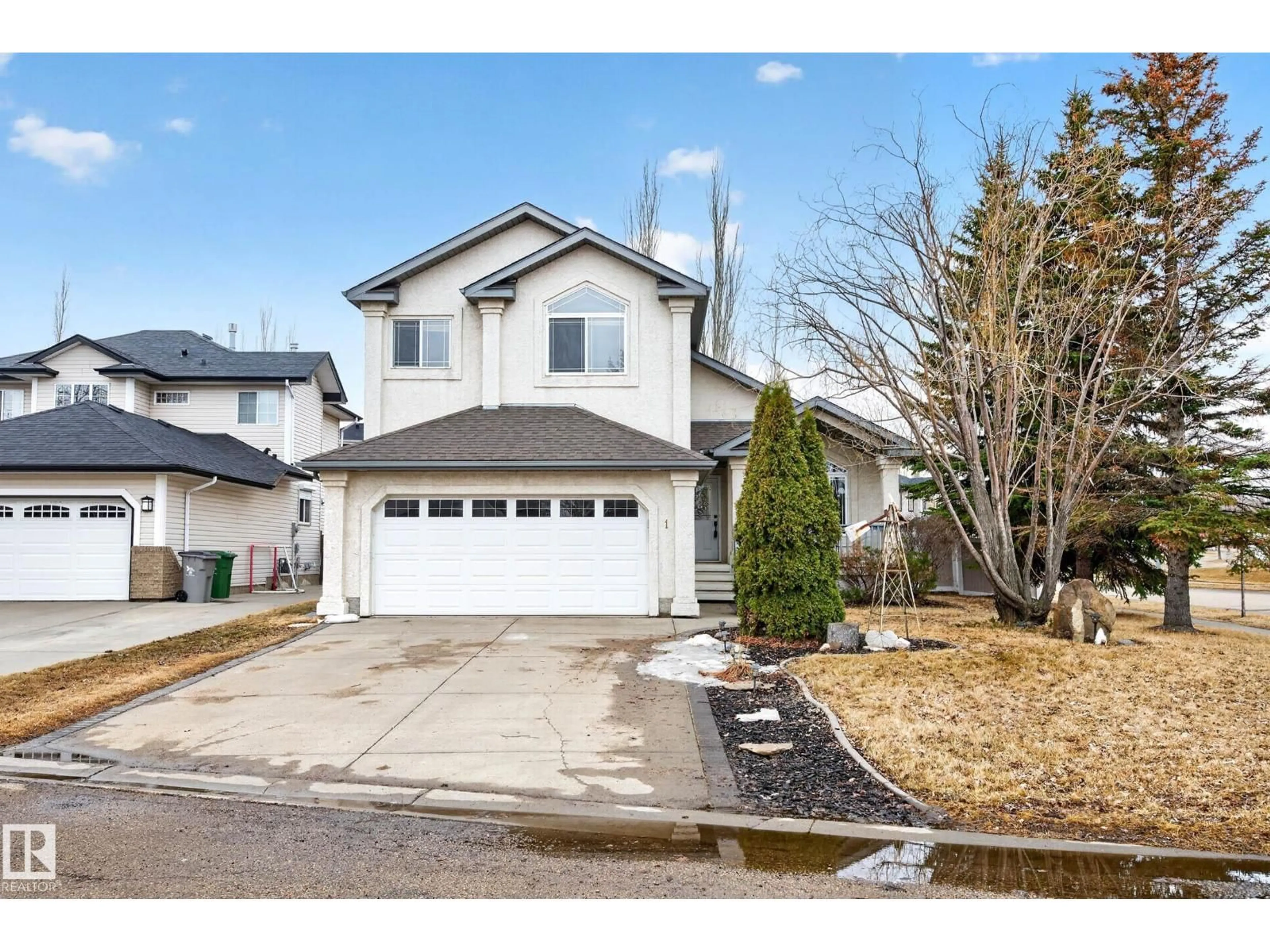 Home with vinyl exterior material, street for 1 BROCHU, Beaumont Alberta T4X1N7