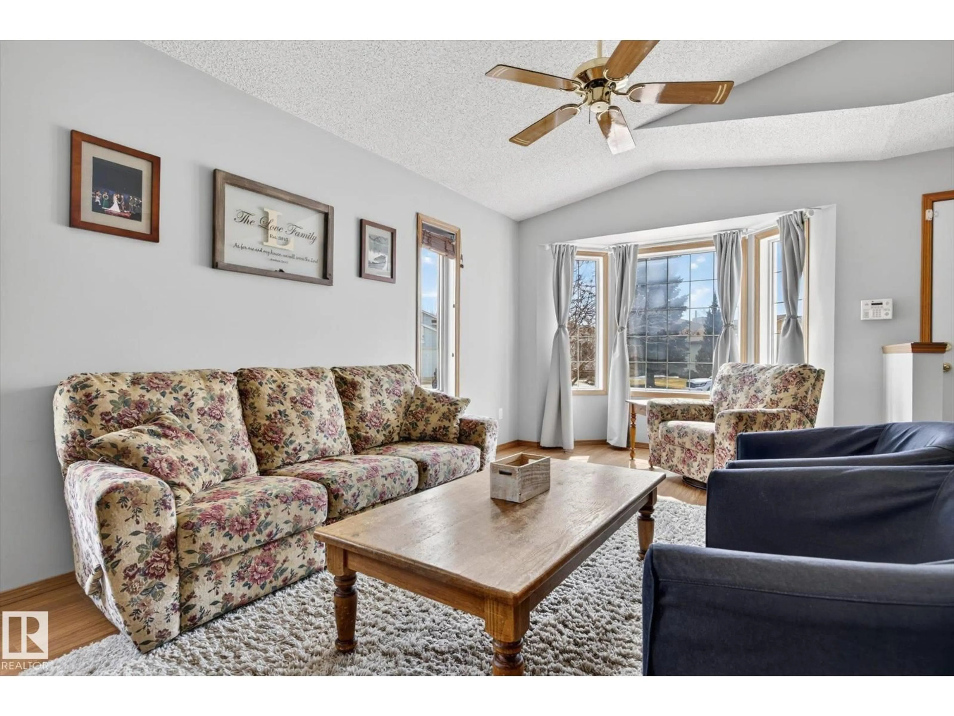 Living room with furniture, unknown for 3004 39 AV, Edmonton Alberta T6T1J5