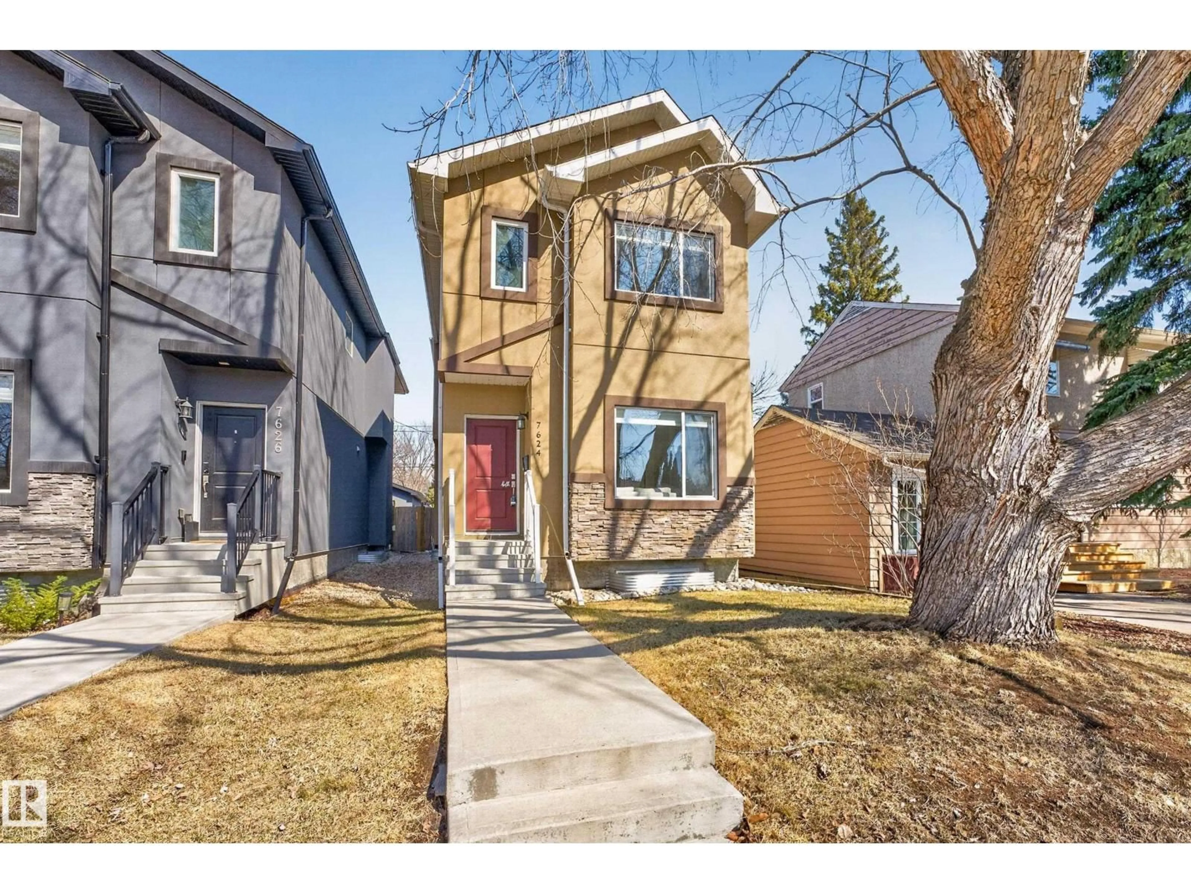 Home with brick exterior material, street for 7624 91 AV, Edmonton Alberta T6C1P8
