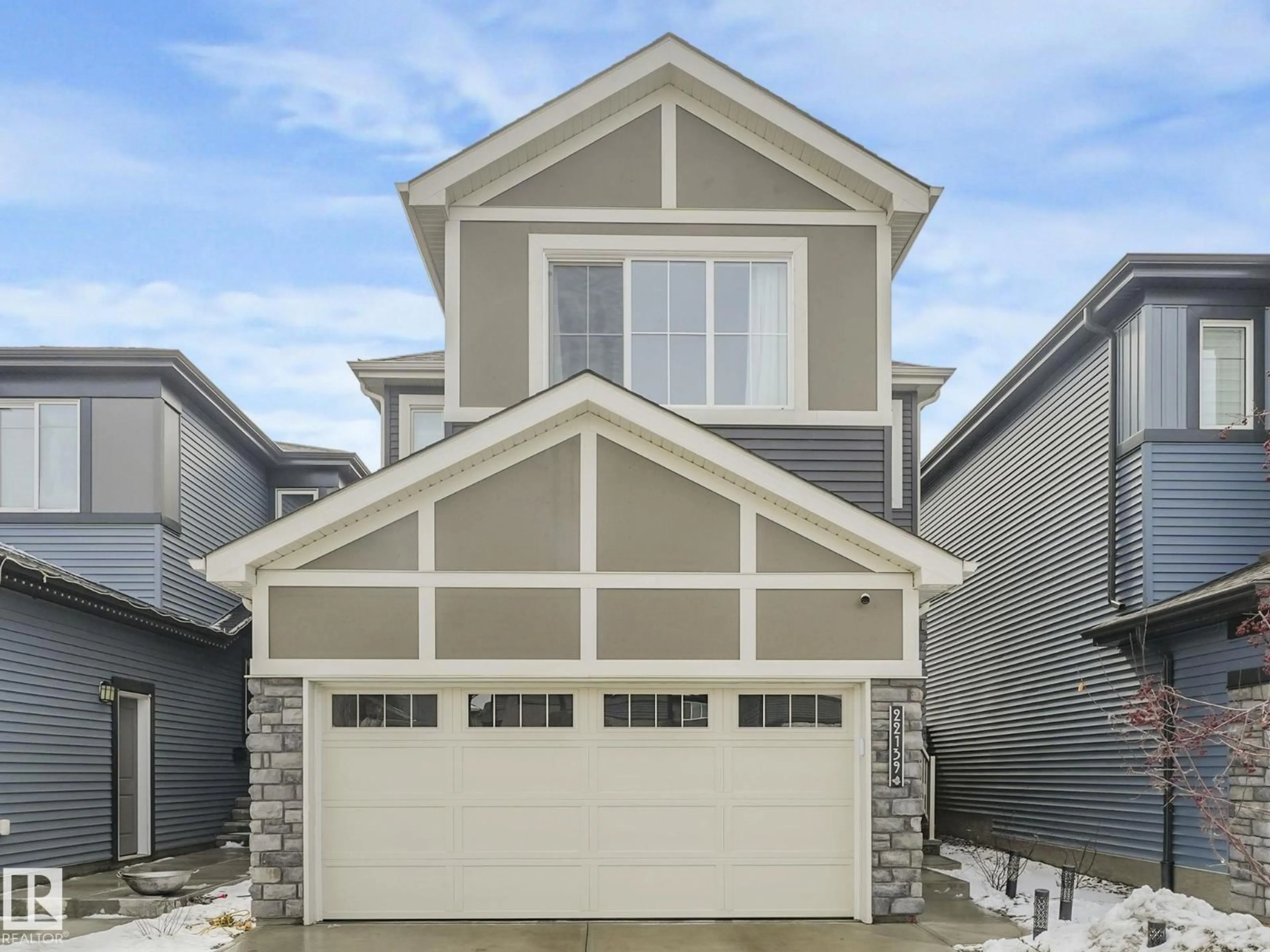 Home with vinyl exterior material, street for 22139 80 AV, Edmonton Alberta T5T7H8