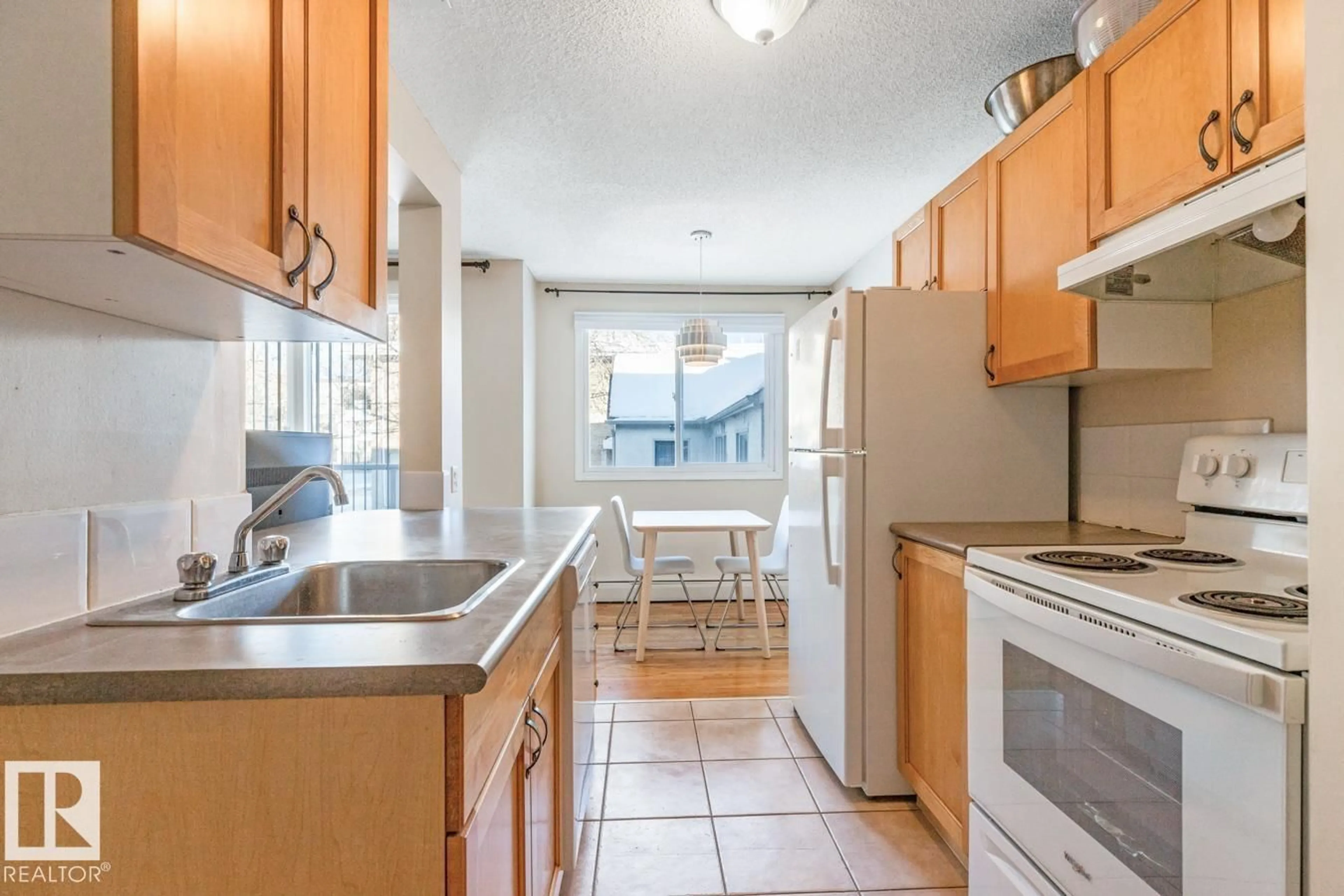 Standard kitchen, ceramic/tile floor for 203 - 10230 120 ST, Edmonton Alberta T5K2A3