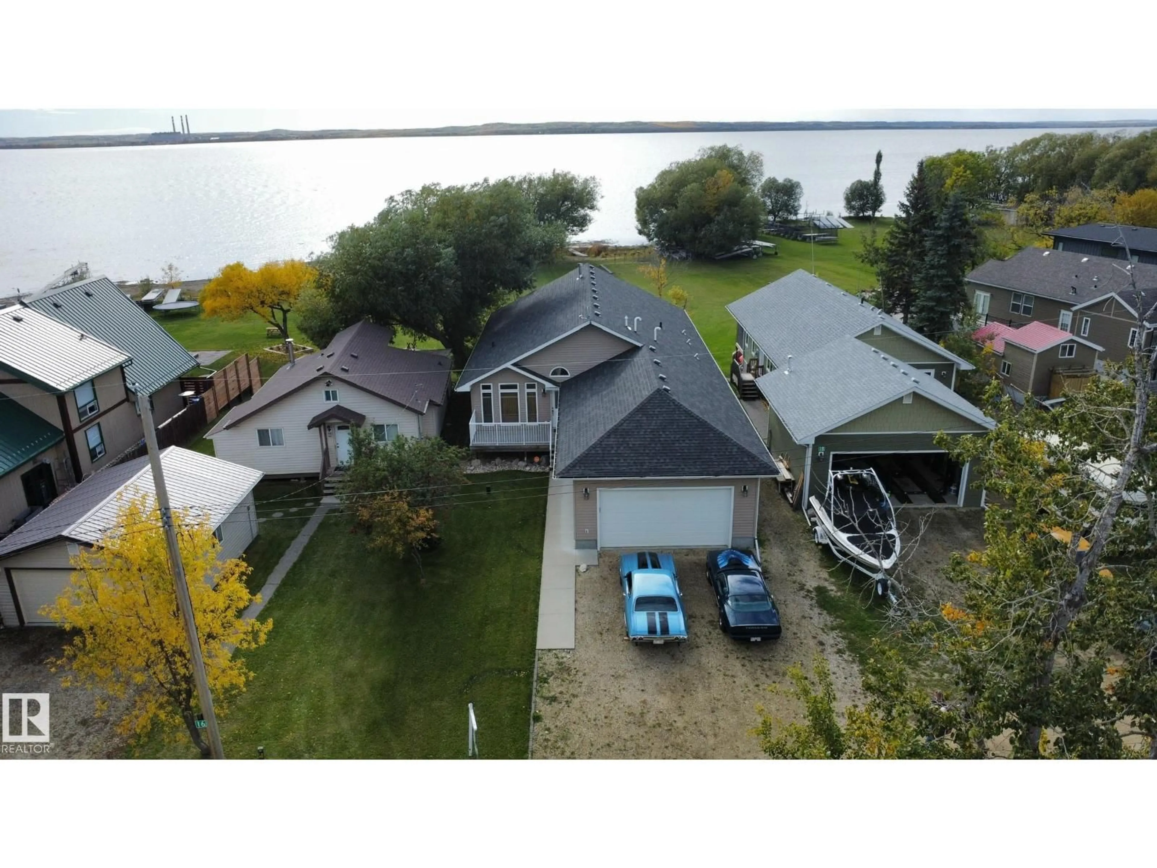 A pic from outside/outdoor area/front of a property/back of a property/a pic from drone, water/lake/river/ocean view for 53026 - 17 RGE ROAD 43, Rural Parkland County Alberta T0E2K0