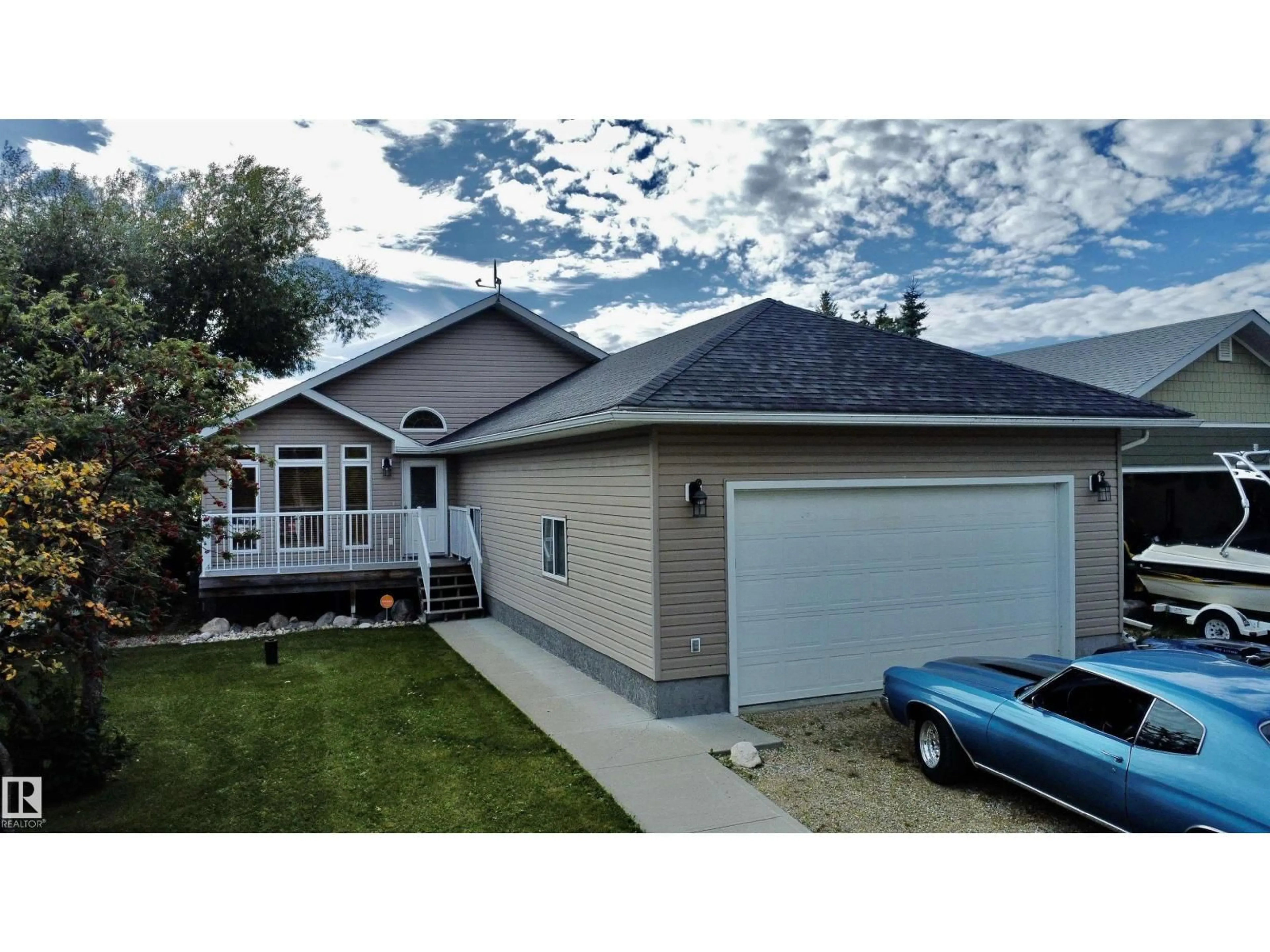 Home with vinyl exterior material, street for 53026 - 17 RGE ROAD 43, Rural Parkland County Alberta T0E2K0