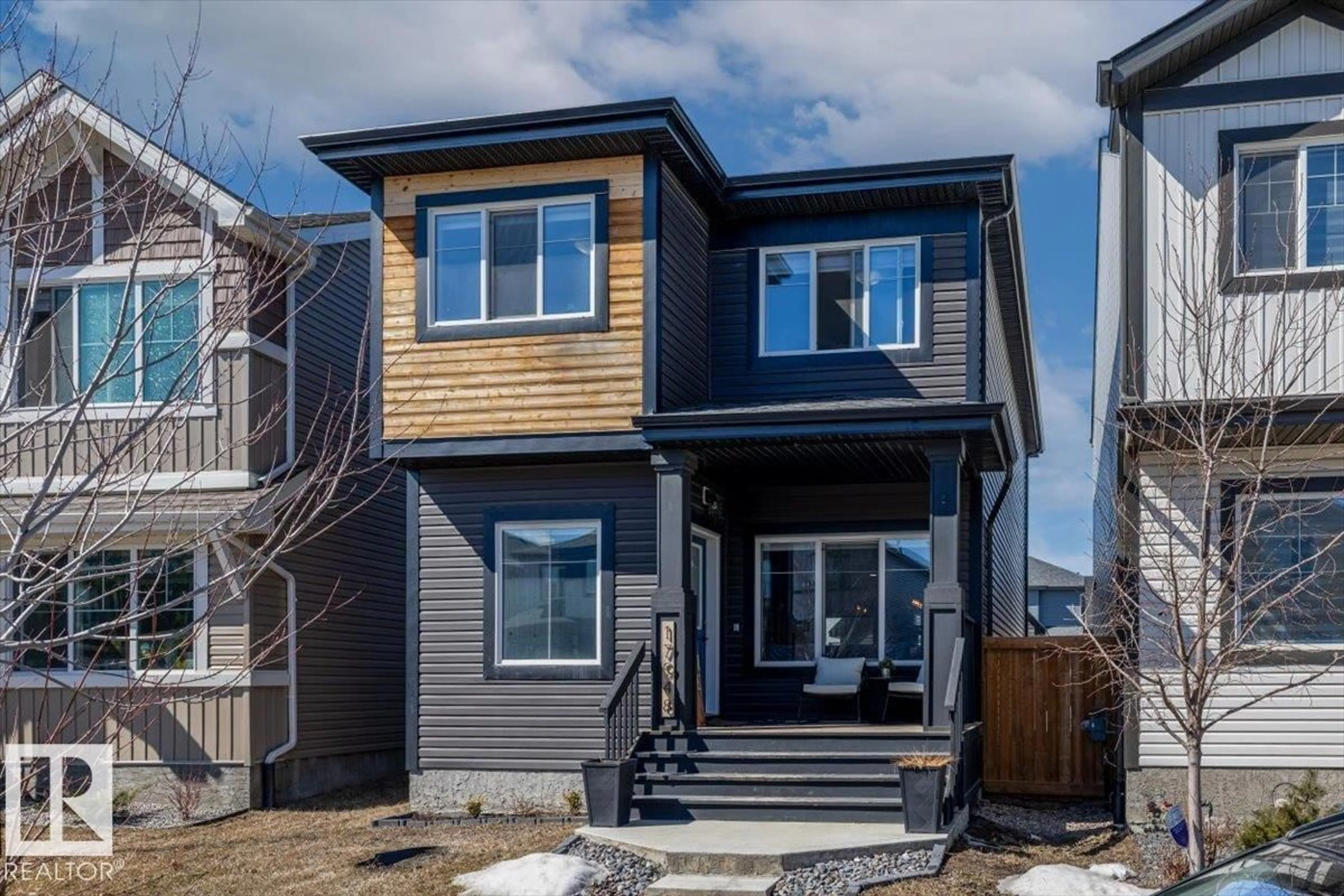 Home with vinyl exterior material, street for NW - 17948 62 ST, Edmonton Alberta T5Y4A6