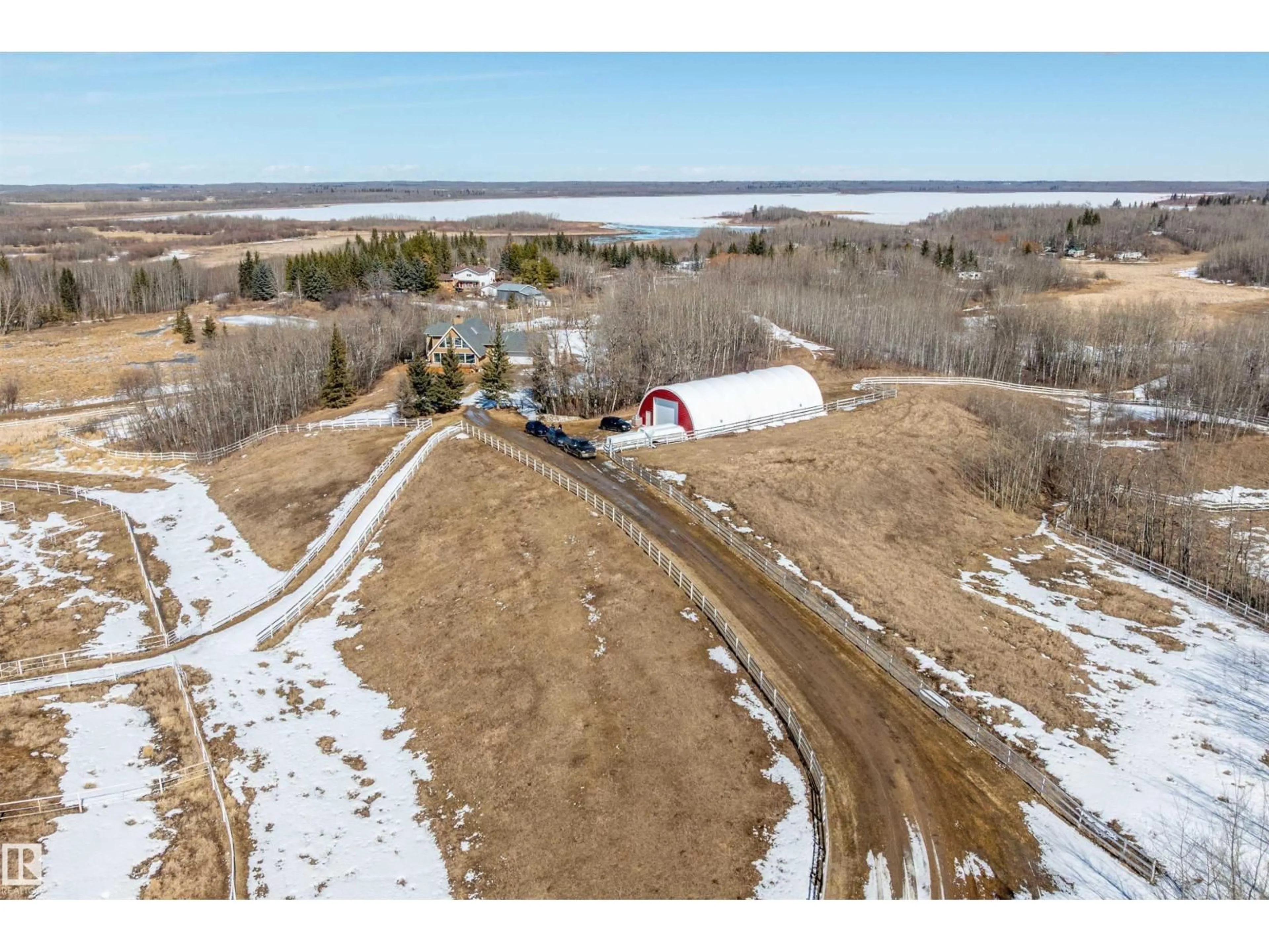 A pic from outside/outdoor area/front of a property/back of a property/a pic from drone, water/lake/river/ocean view for 51231 RGE ROAD 210, Rural Strathcona County Alberta T8G1G1