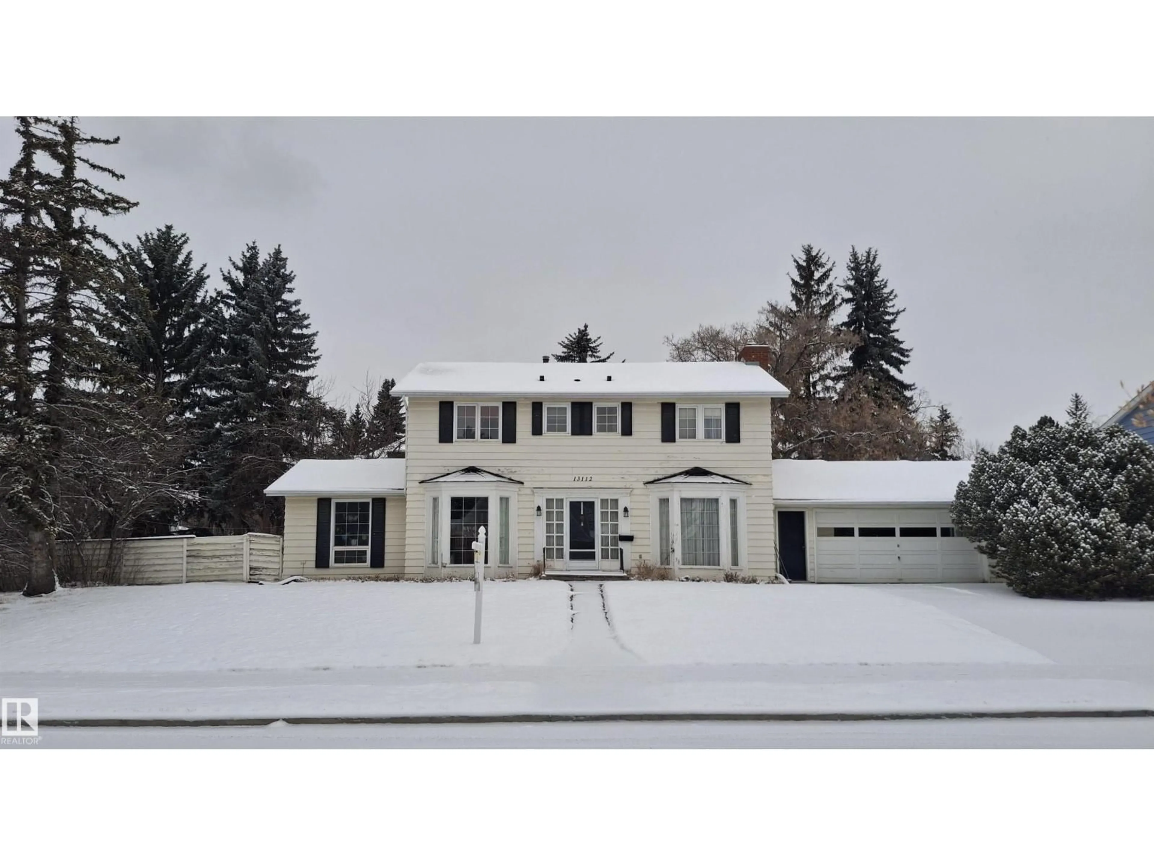 Home with vinyl exterior material, street for 13112 63 AV, Edmonton Alberta T6H1S2