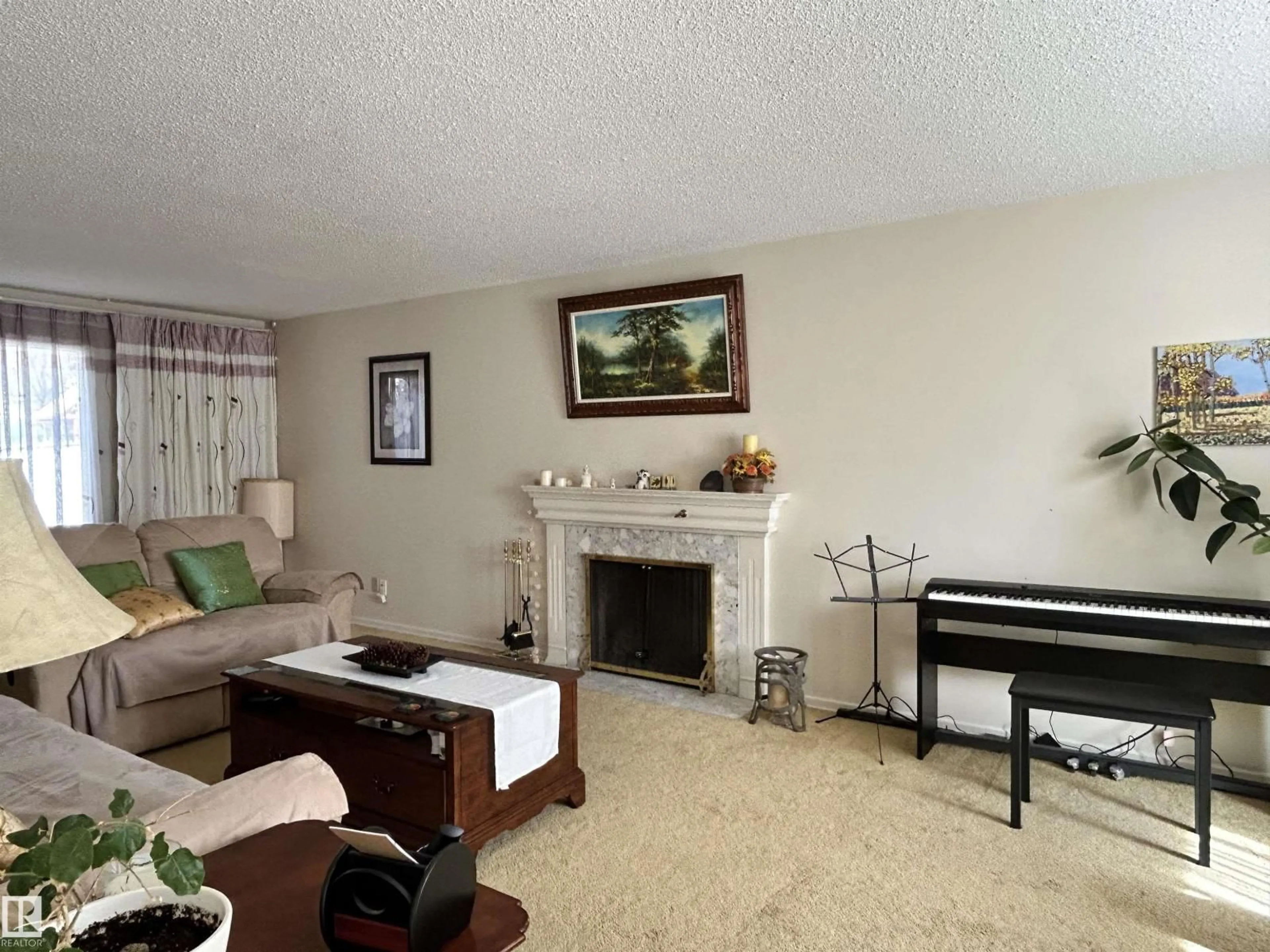 Living room with furniture, unknown for 13112 63 AV, Edmonton Alberta T6H1S2