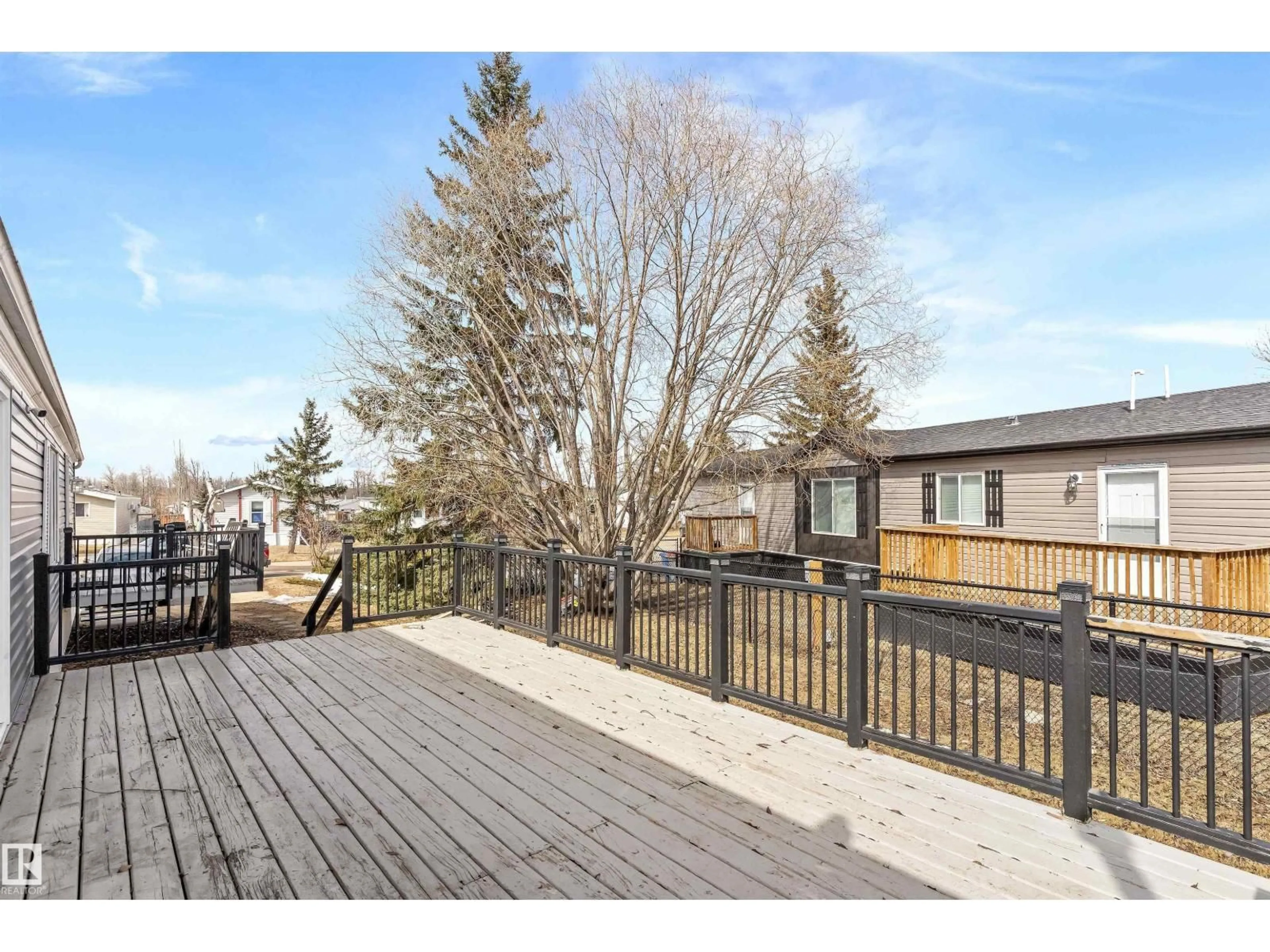 A pic from outside/outdoor area/front of a property/back of a property/a pic from drone, street for 232 53222 RR 272, Rural Parkland County Alberta T7X3N8