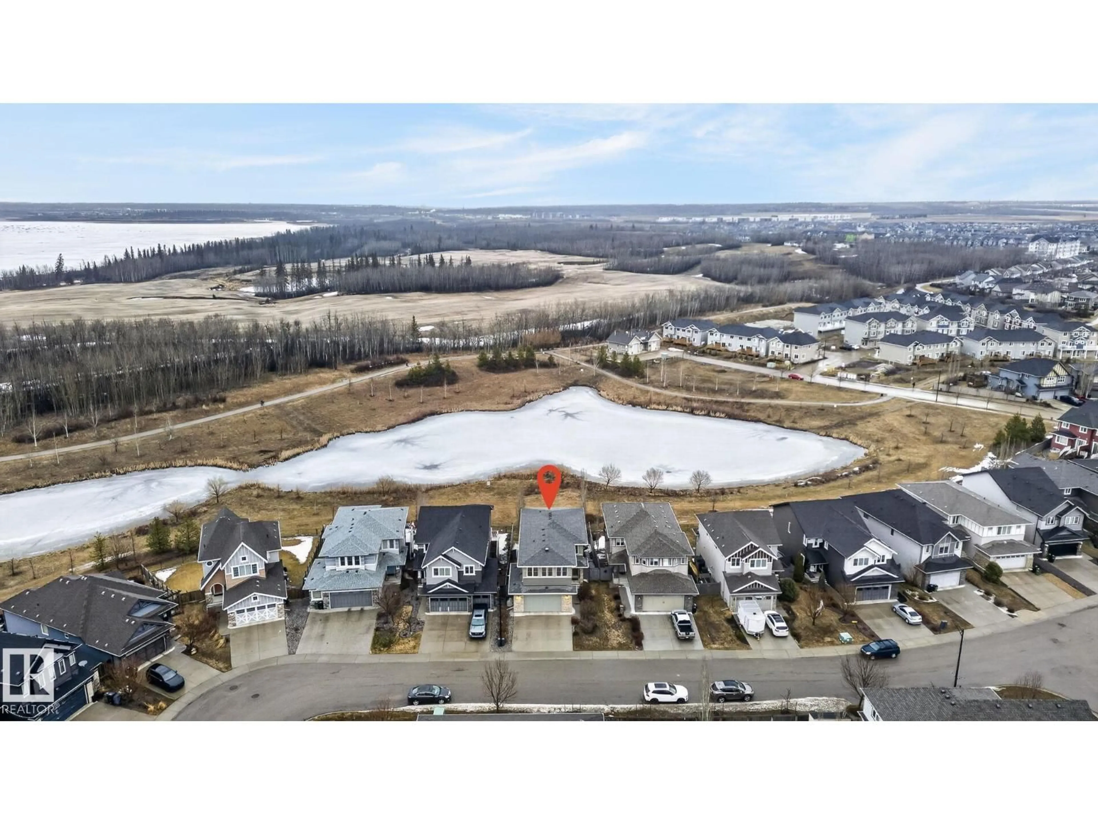 A pic from outside/outdoor area/front of a property/back of a property/a pic from drone, water/lake/river/ocean view for NW - 20620 131 AV, Edmonton Alberta T5S0J3