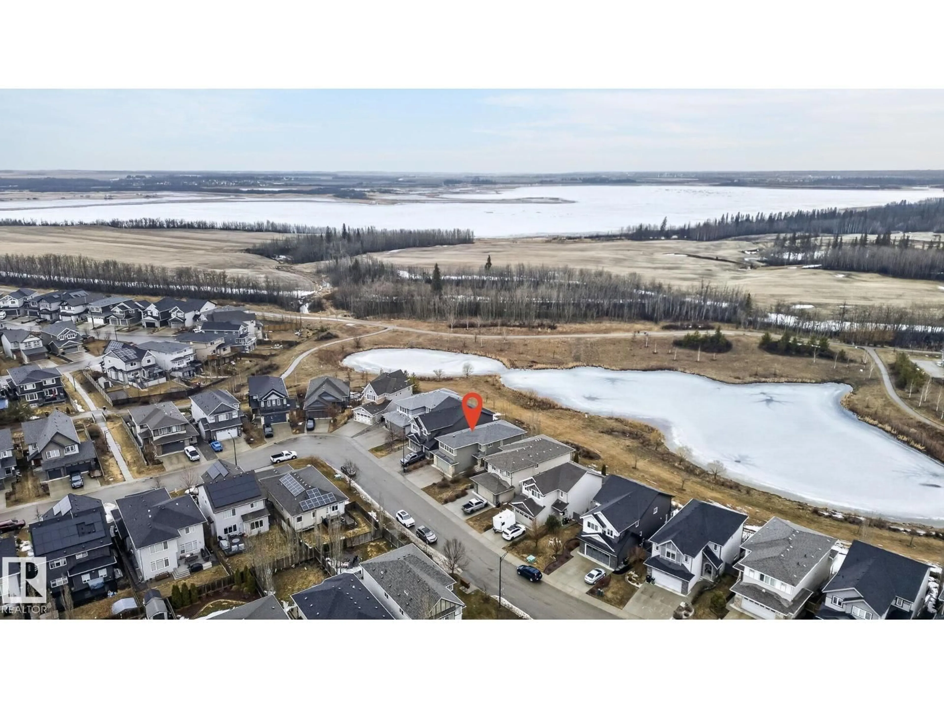 A pic from outside/outdoor area/front of a property/back of a property/a pic from drone, water/lake/river/ocean view for NW - 20620 131 AV, Edmonton Alberta T5S0J3