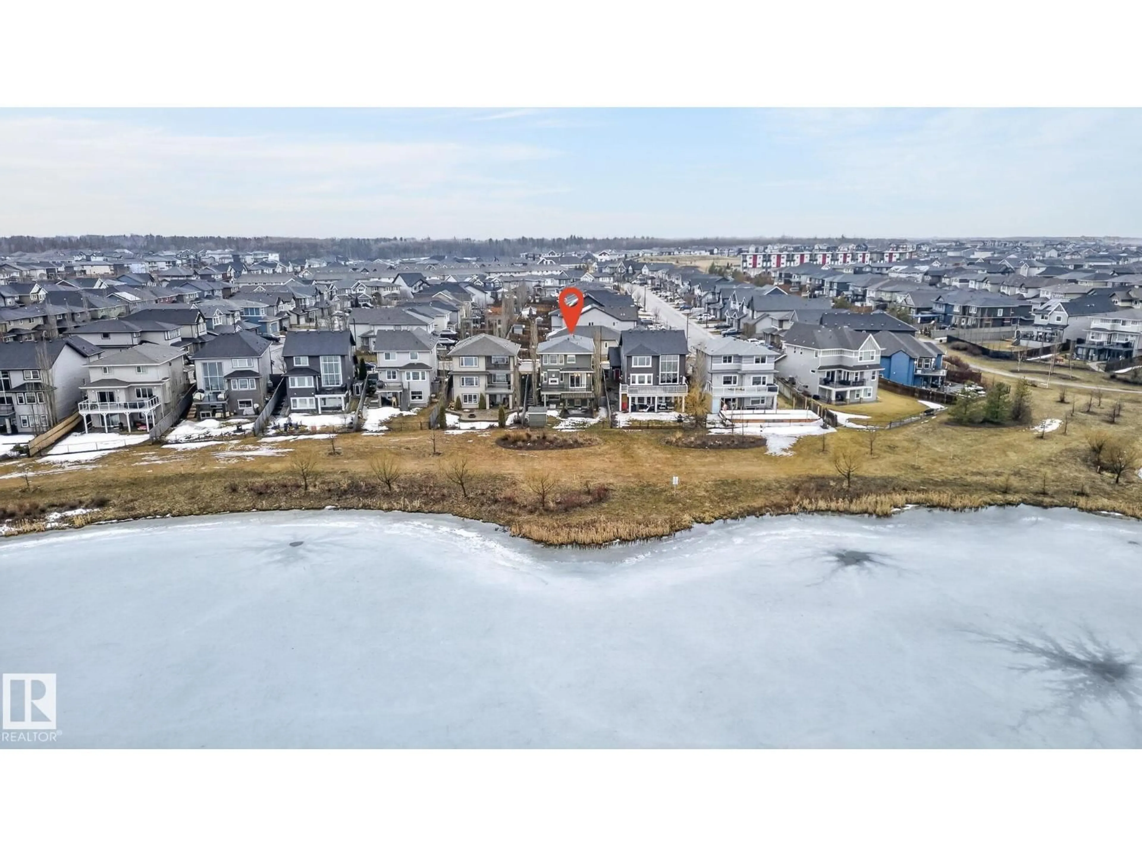 A pic from outside/outdoor area/front of a property/back of a property/a pic from drone, water/lake/river/ocean view for NW - 20620 131 AV, Edmonton Alberta T5S0J3