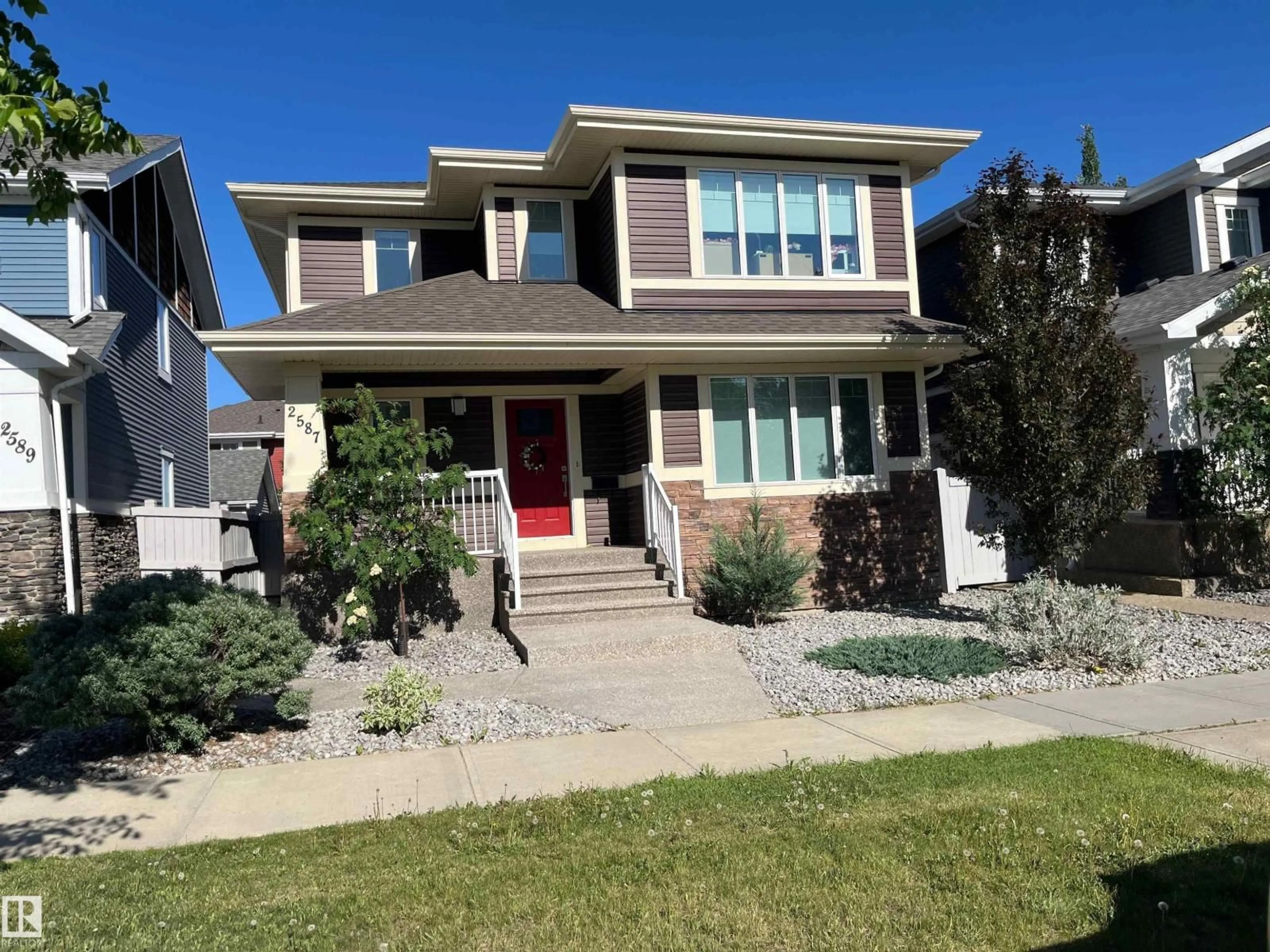 Home with vinyl exterior material, street for 2587 PEGASUS BV, Edmonton Alberta T5E6R1