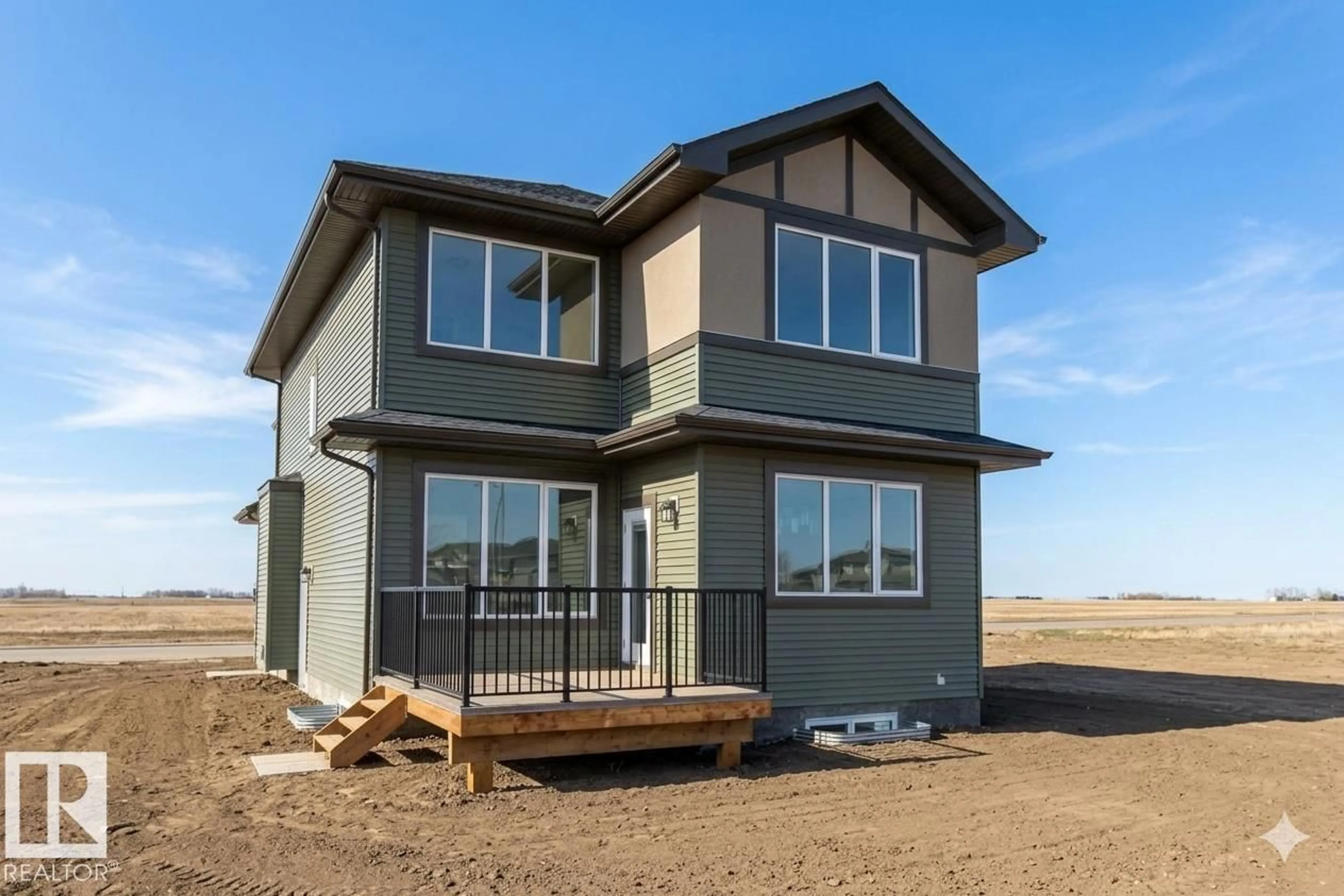 Home with vinyl exterior material, building for NW - 8414 223 A ST, Edmonton Alberta T5T7X2