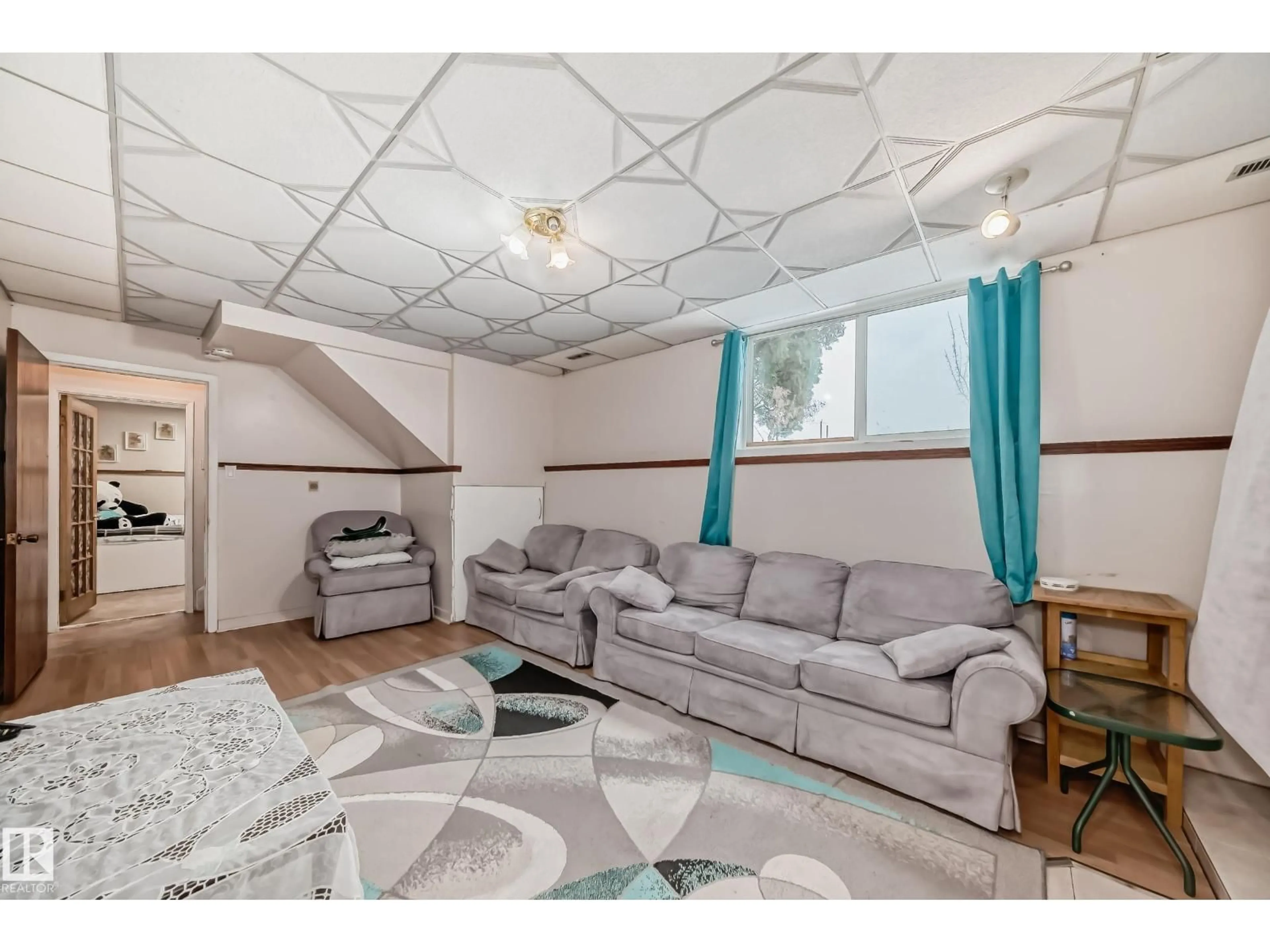 Living room with furniture, unknown for 6807 DELWOOD RD, Edmonton Alberta T5C3A6