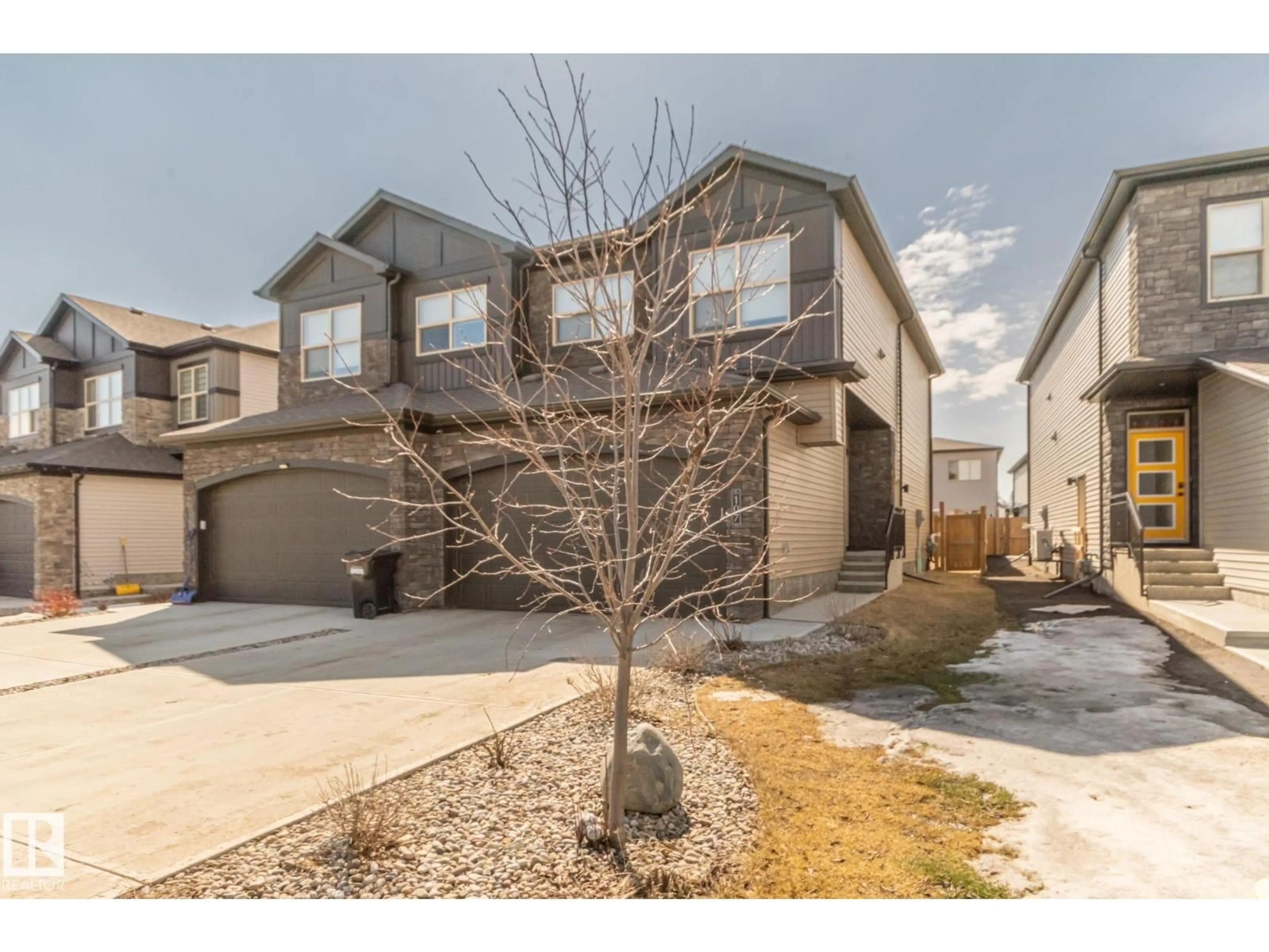 A pic from outside/outdoor area/front of a property/back of a property/a pic from drone, street for 107 GARNEAU GA, Spruce Grove Alberta T7X0M6