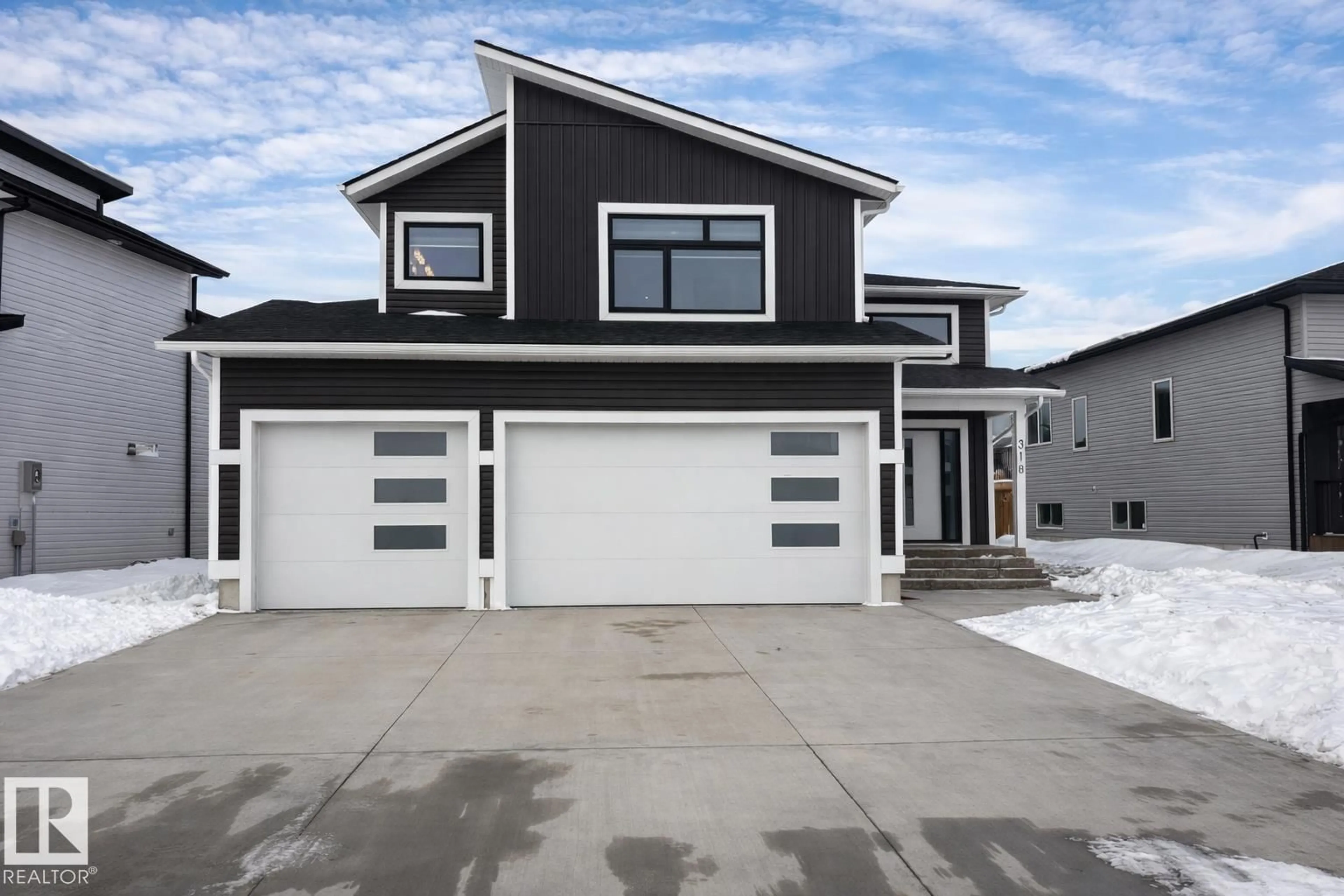 Home with vinyl exterior material, street for 318 FUNDY WY, Cold Lake Alberta T9M0M4